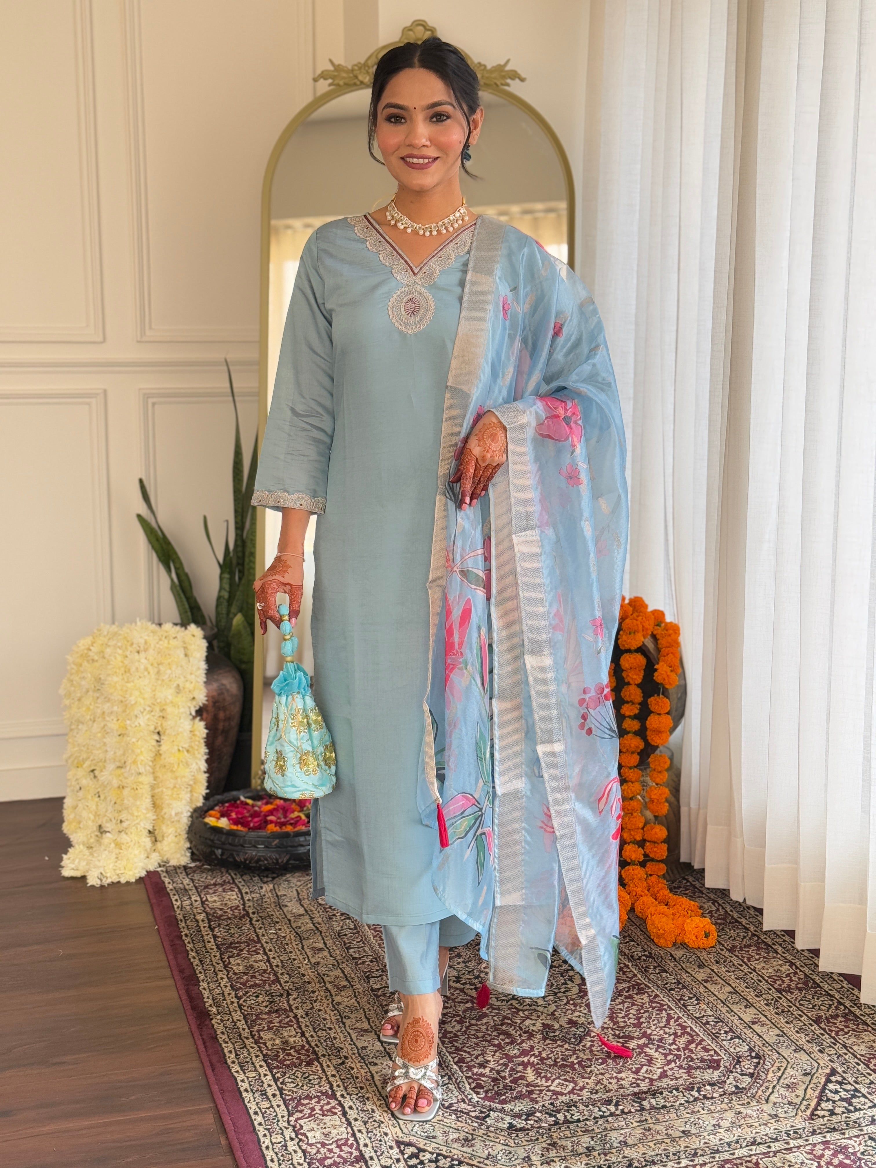 Elegant woman's traditional outfit in vibrant blue