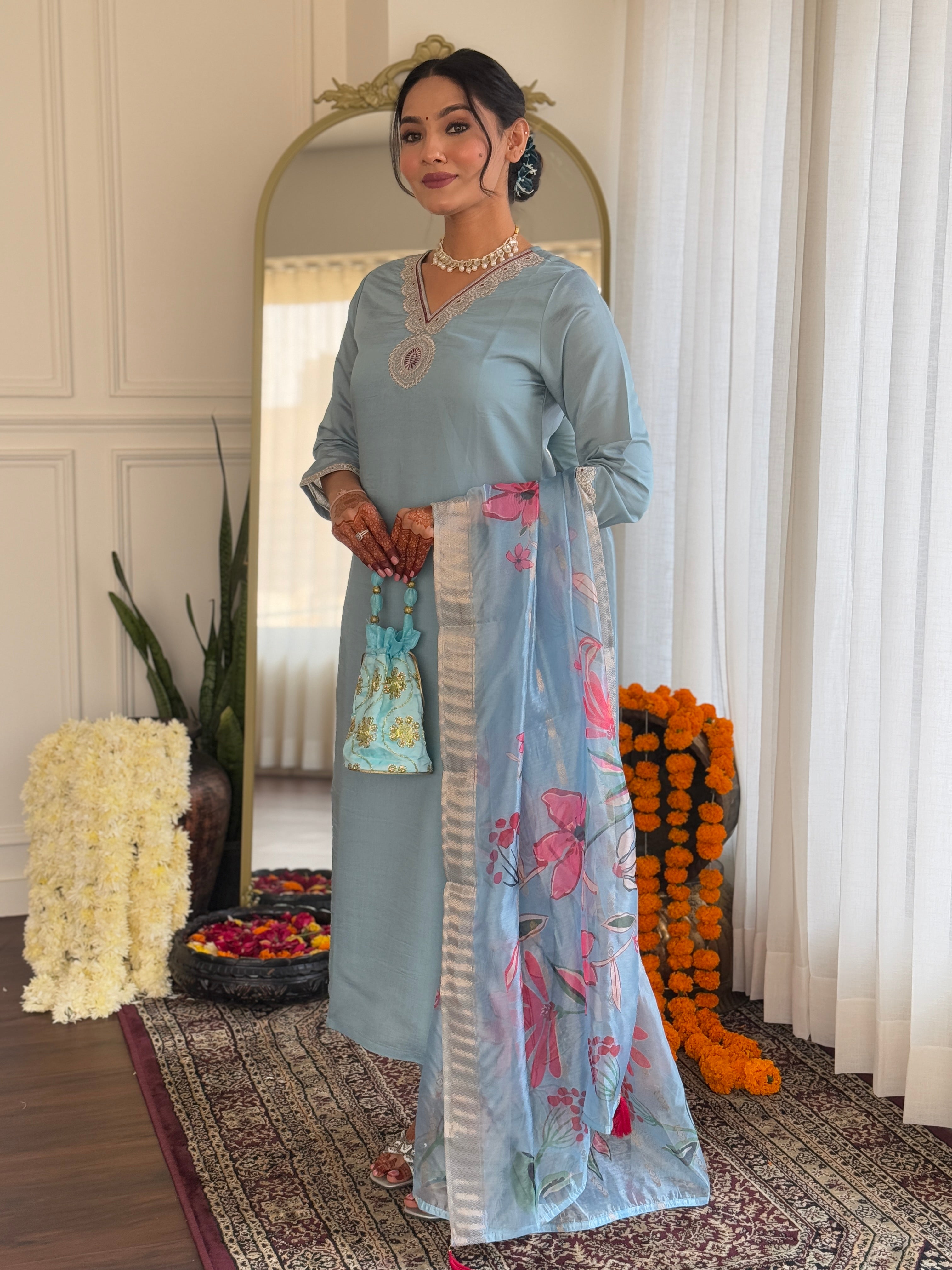 Elegant woman's traditional outfit in vibrant blue