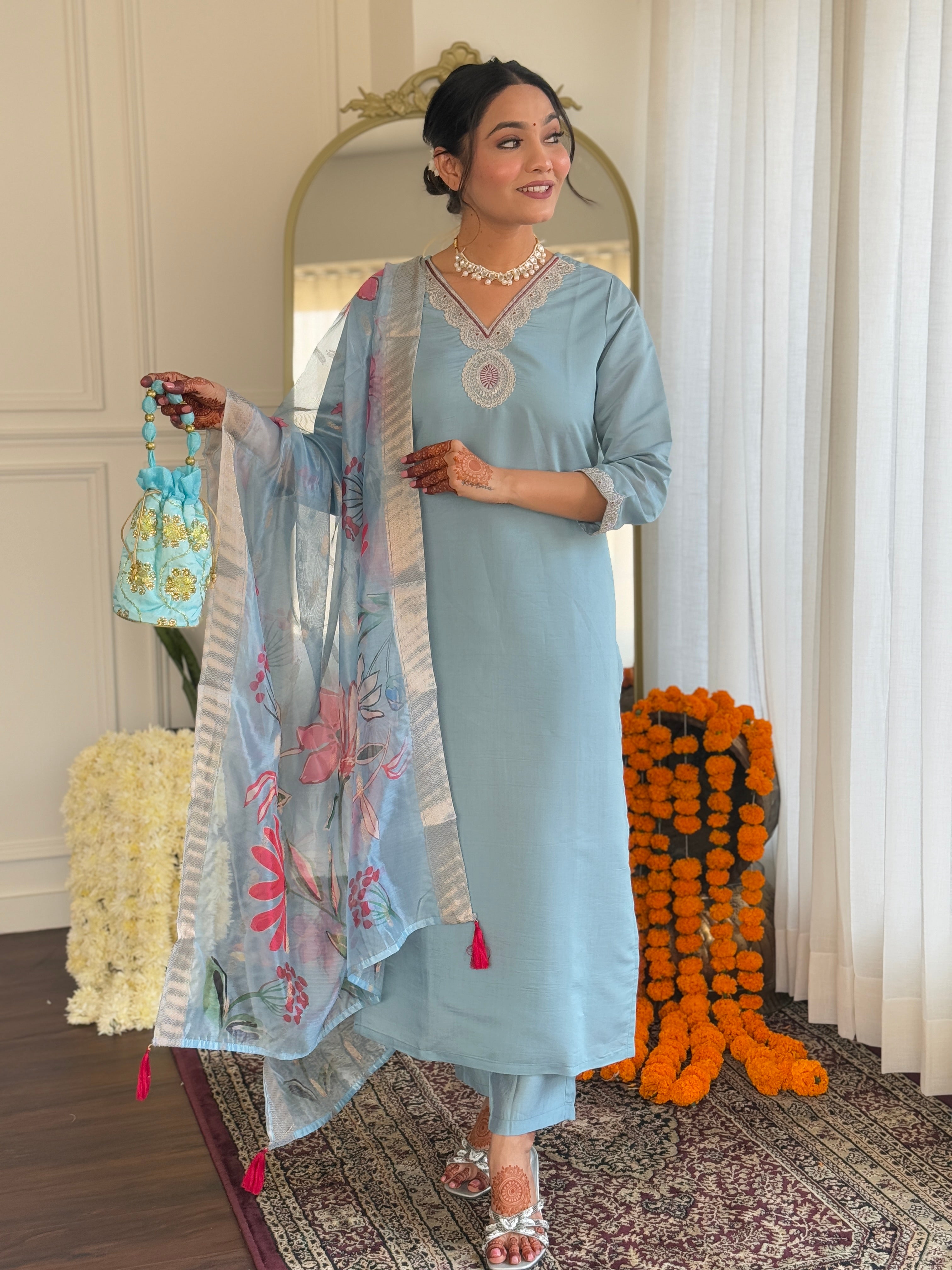 Elegant woman's traditional outfit in vibrant blue