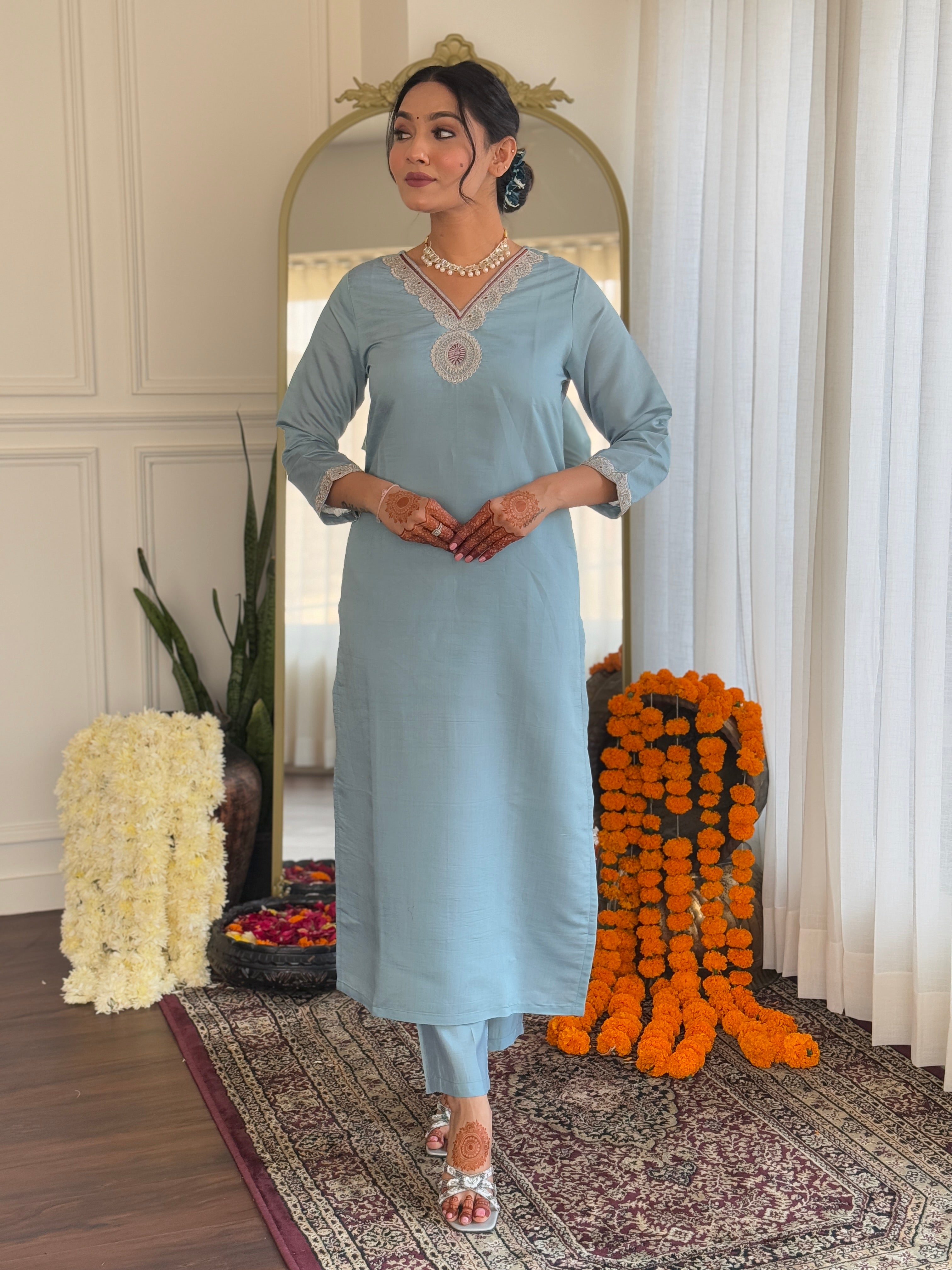 Elegant woman's traditional outfit in vibrant blue