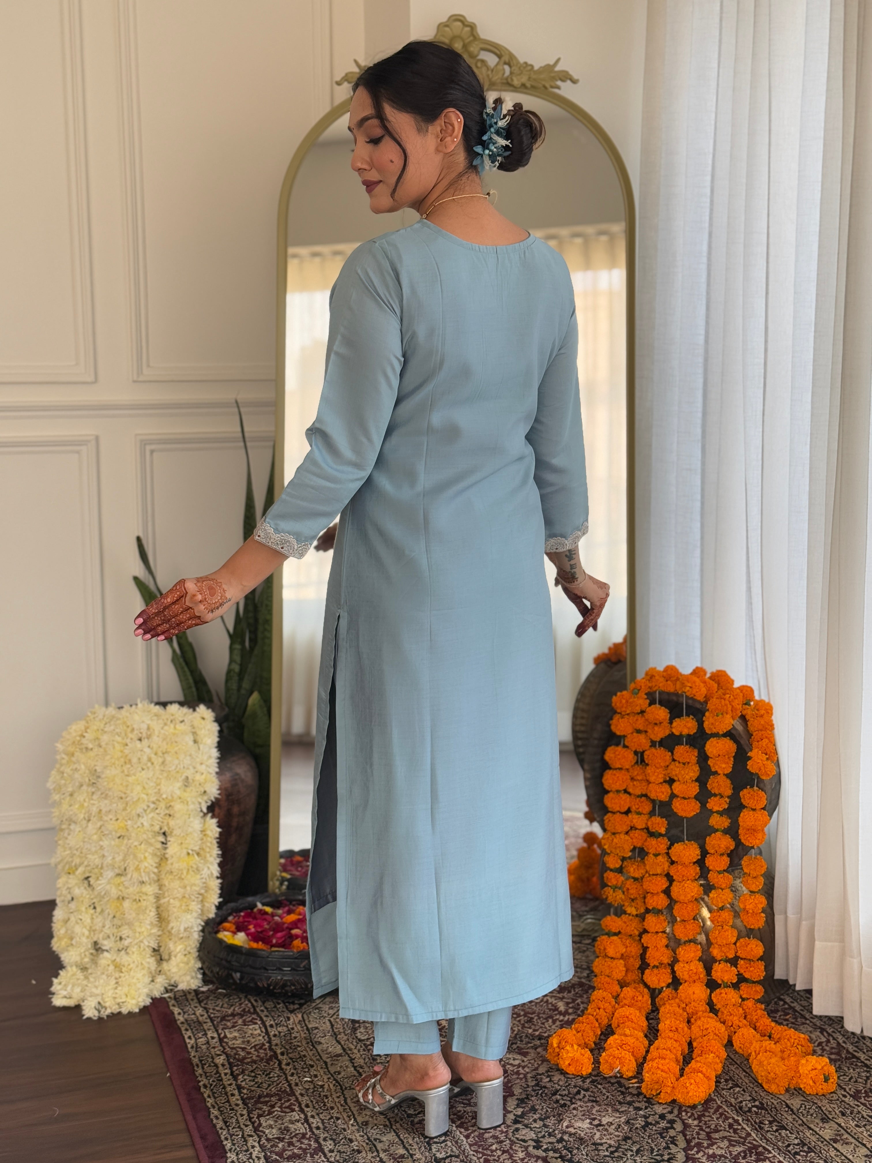 Elegant woman's traditional outfit in vibrant blue