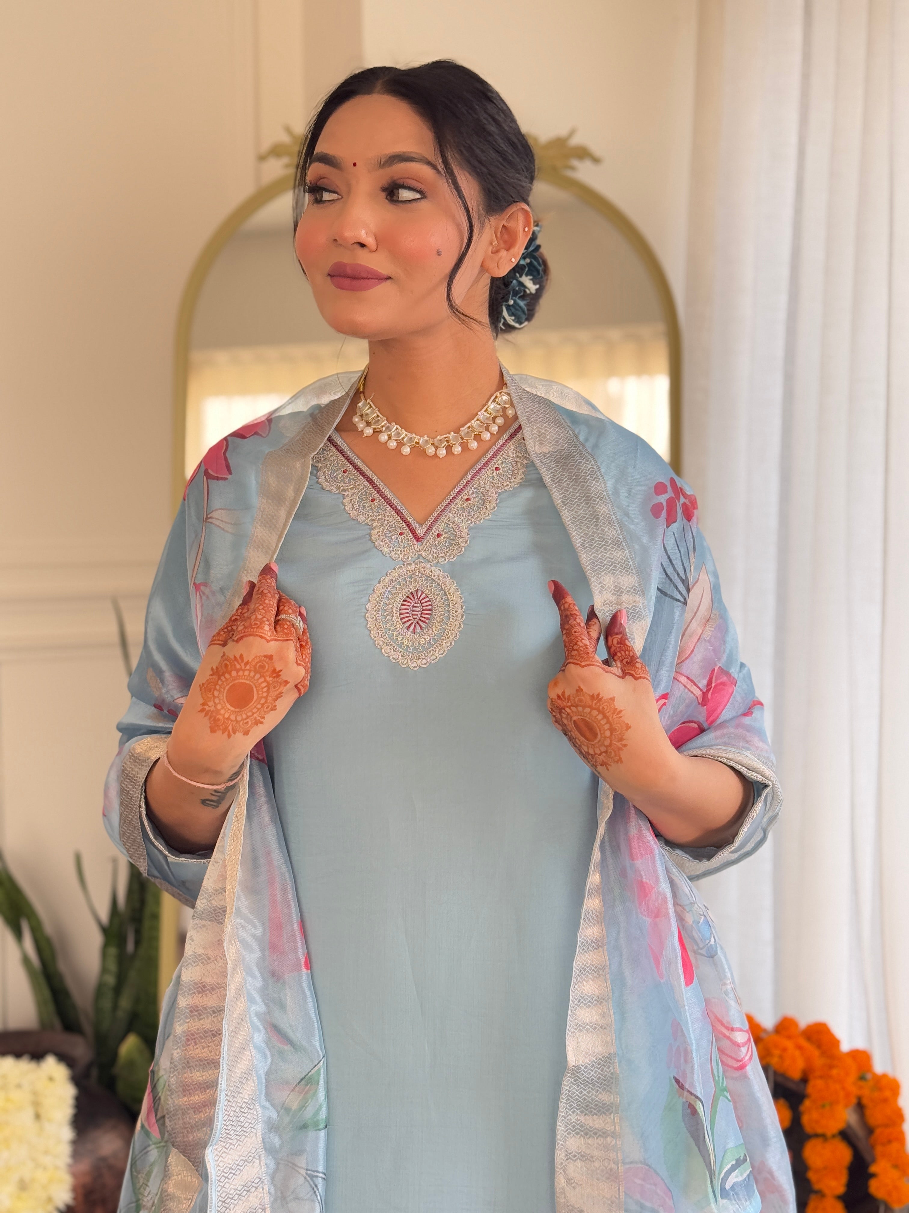 Elegant woman's traditional outfit in vibrant blue