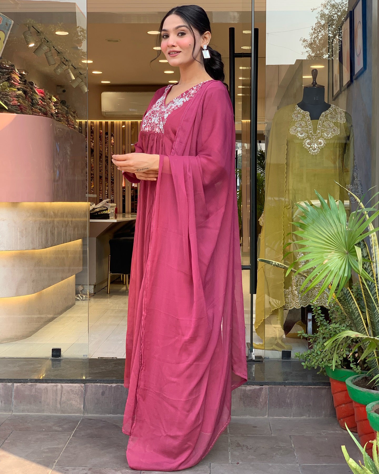 Woman in a embroidery work  traditional outfit .