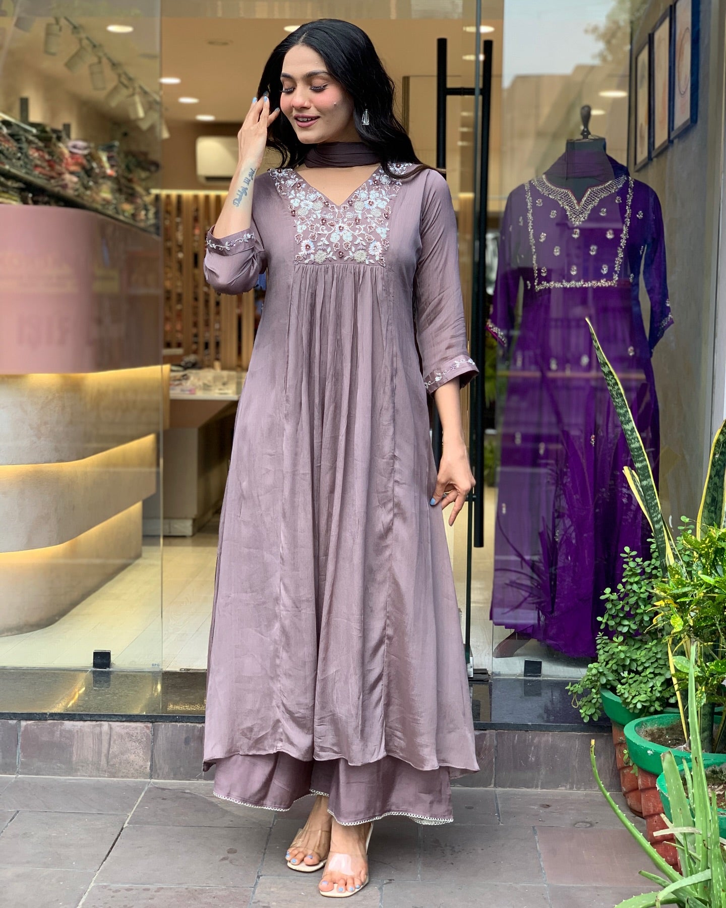 Woman in a embroidery work  traditional outfit .