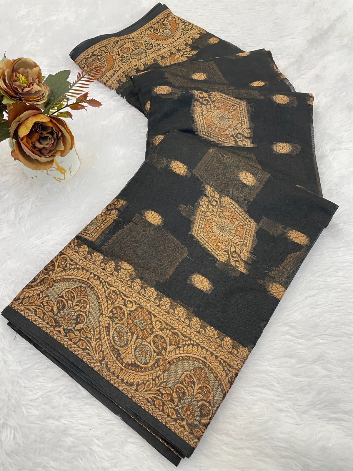 Elevate your ethnic wardrobe with this stunning organza saree