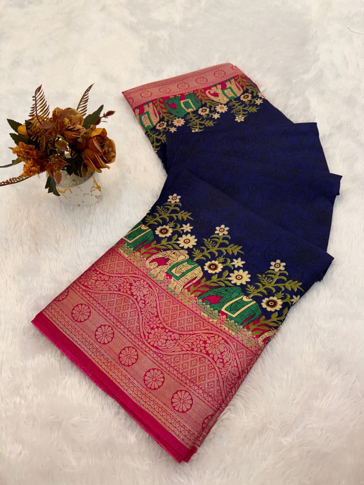 ethnic wardrobe with this exquisite pair of traditional patterned sarees