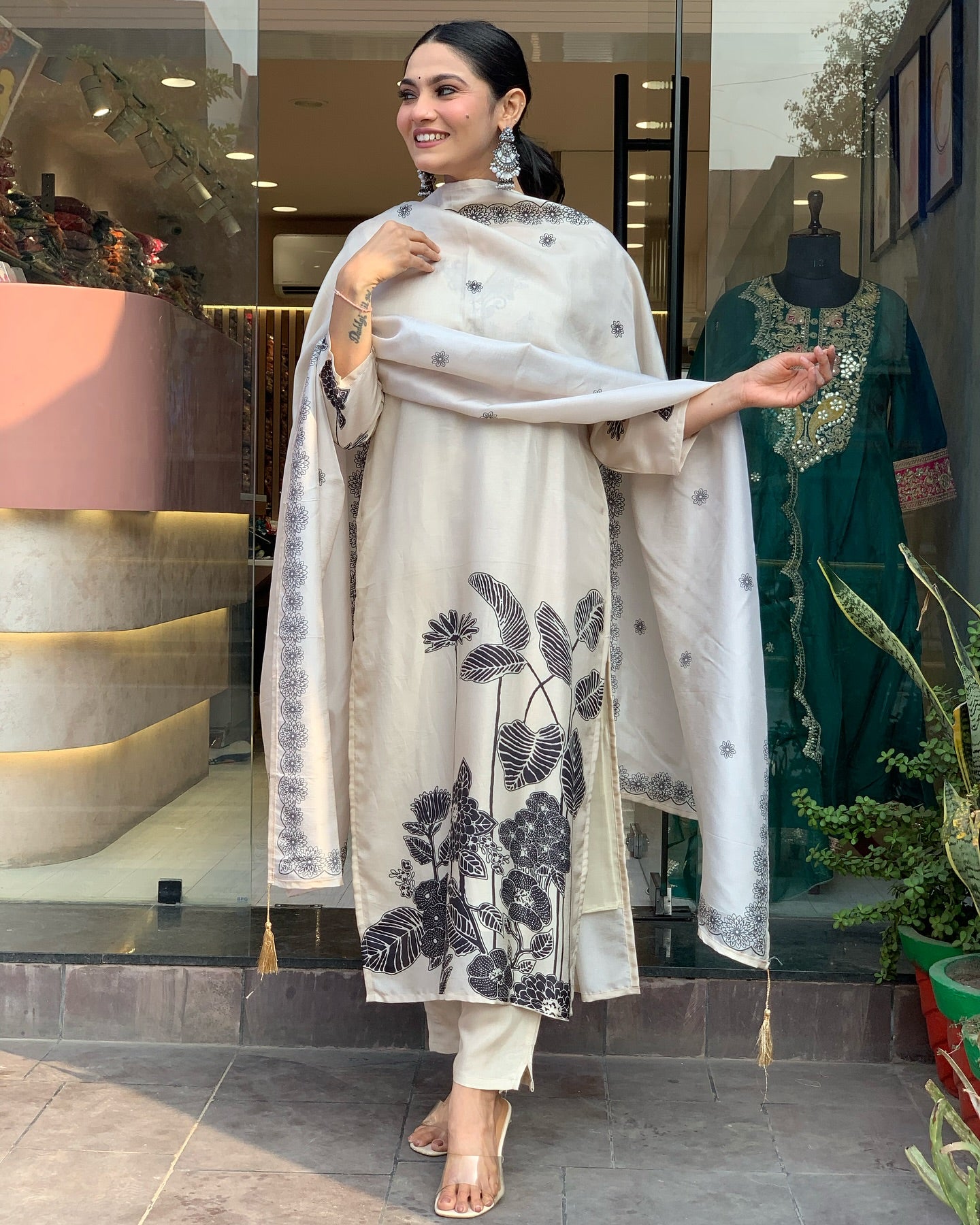 Woman in a floral outfit black n white 