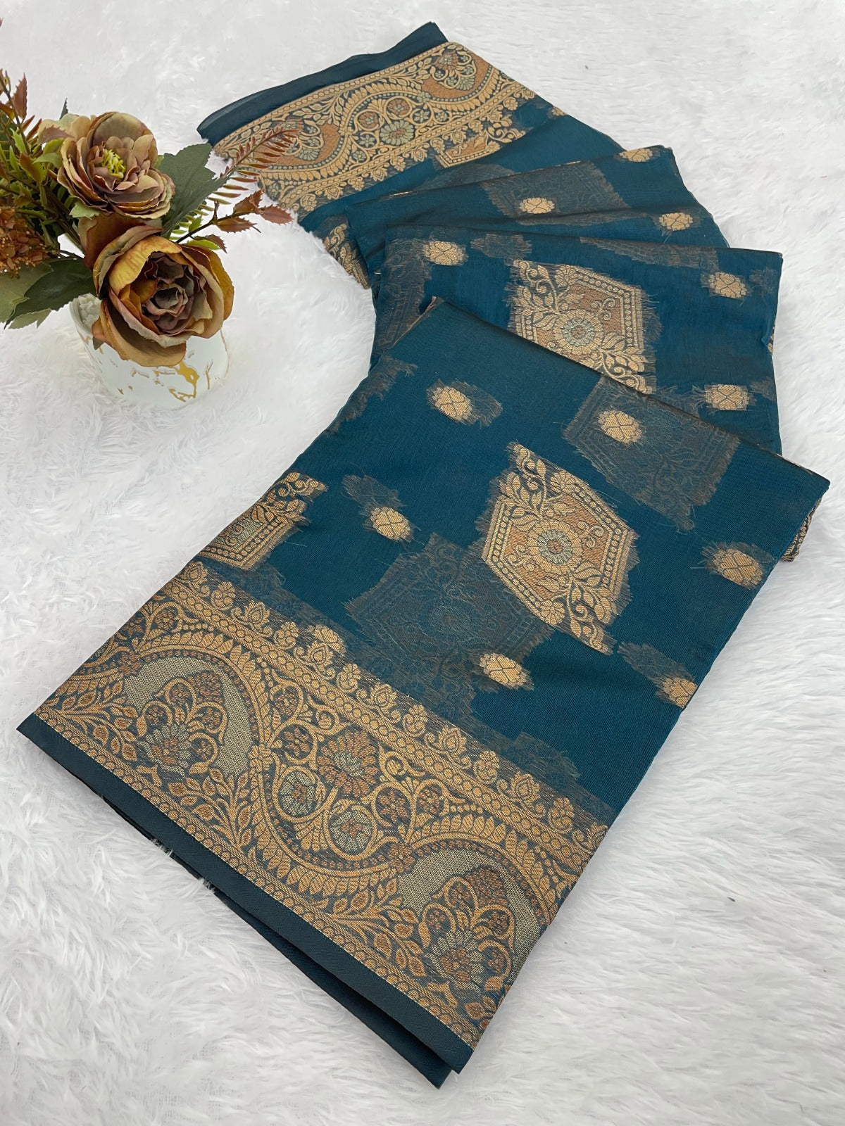 Elevate your ethnic wardrobe with this stunning organza saree
