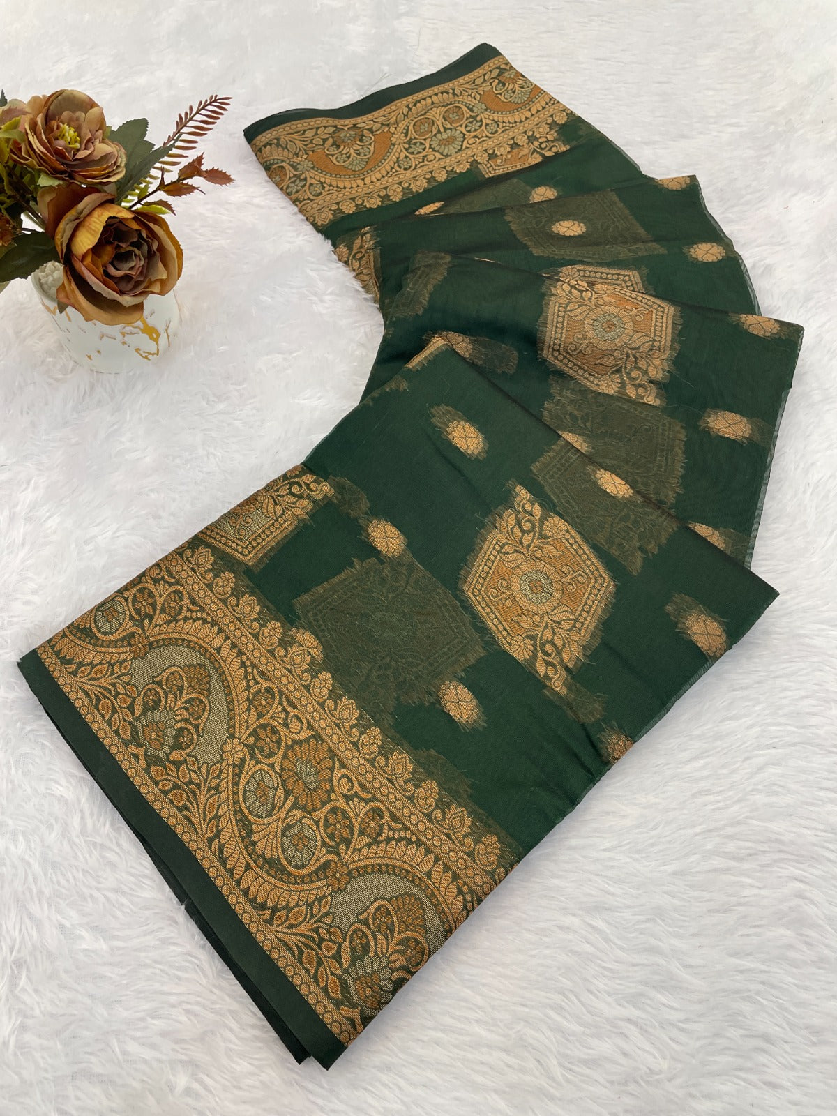 Elevate your ethnic wardrobe with this stunning organza saree