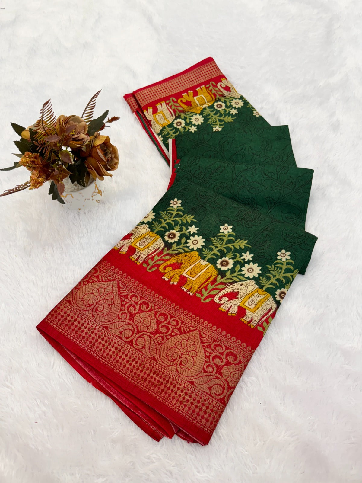 ethnic wardrobe with this exquisite pair of traditional patterned sarees