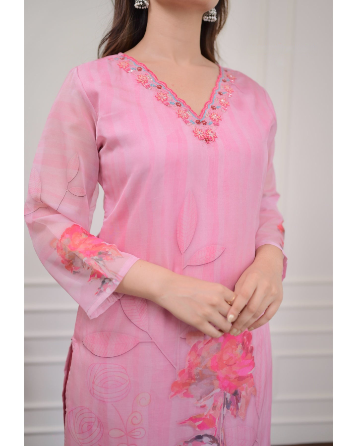 pink floral outfit .