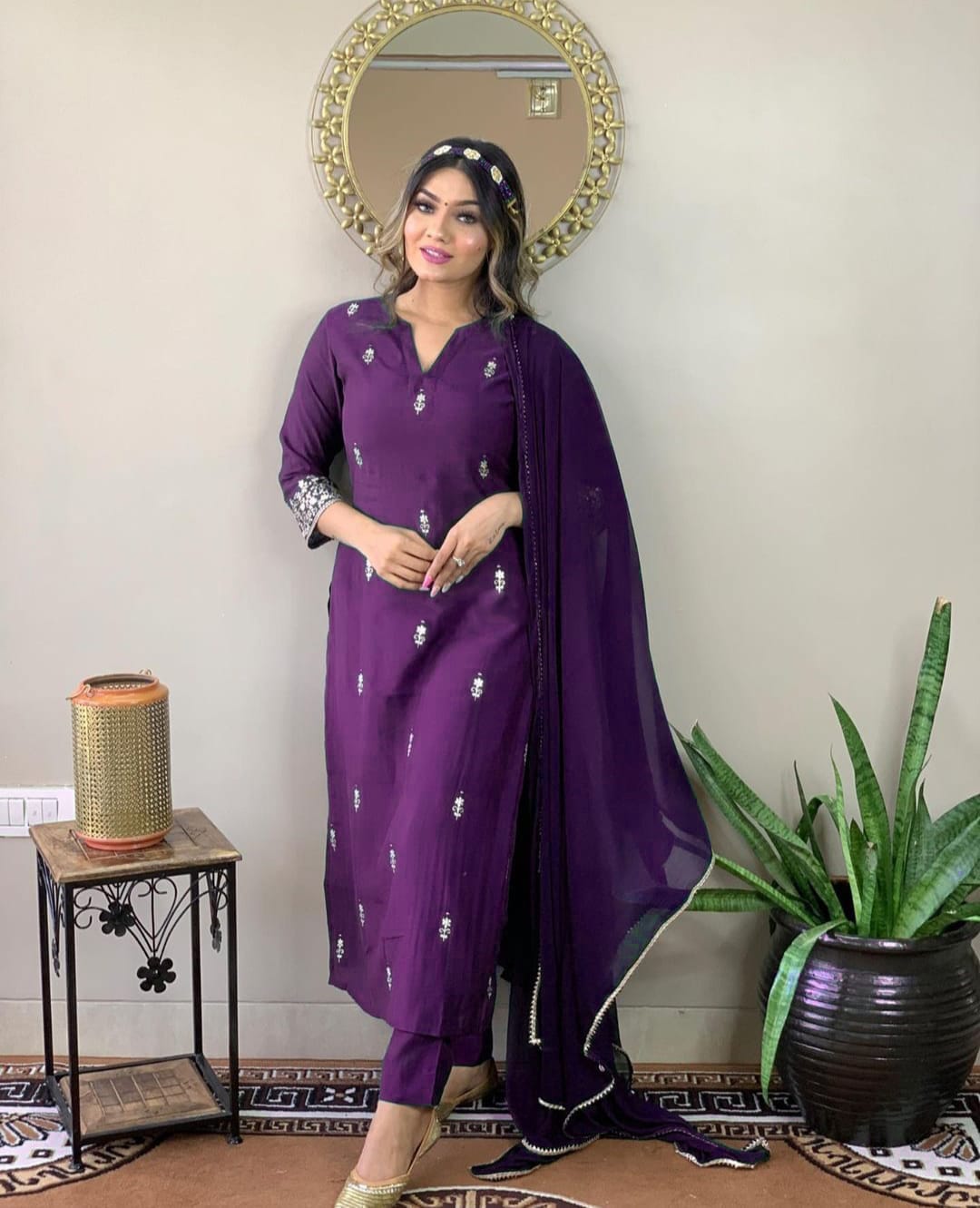 Woman in a purple traditional outfit 