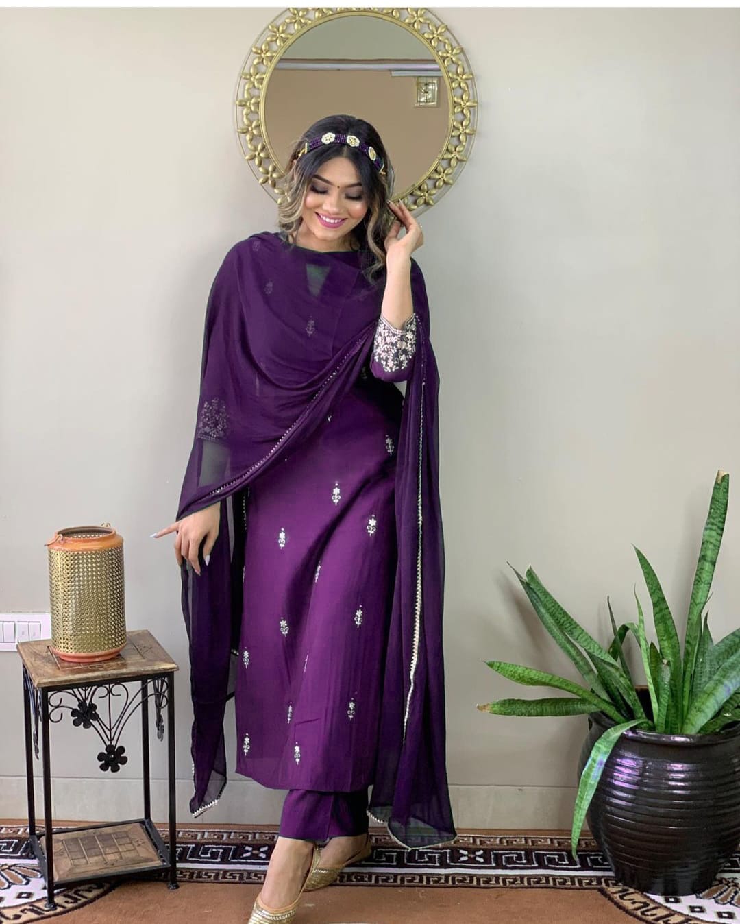 Woman in a purple traditional outfit