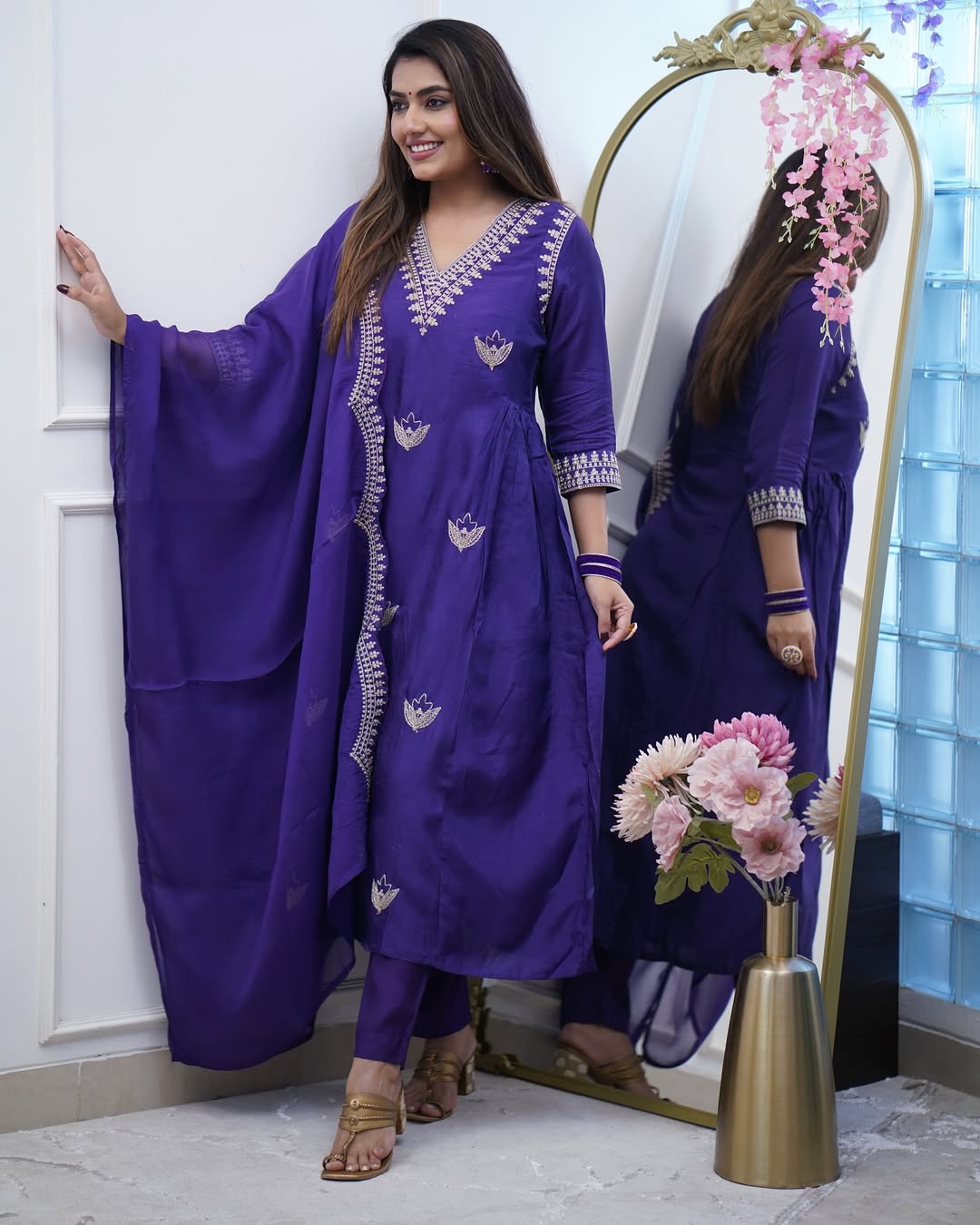 Woman in a purple traditional outfit 