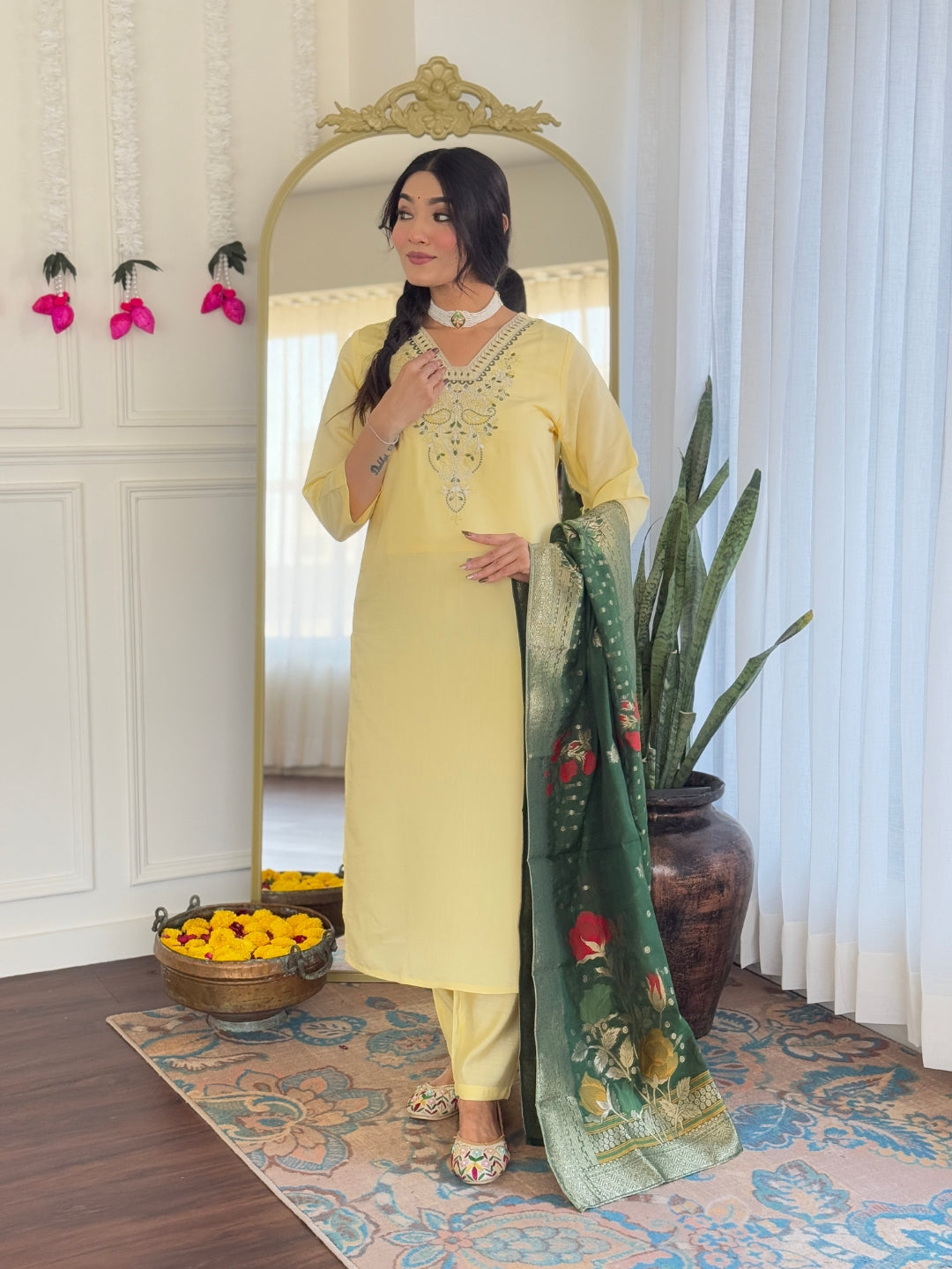 yellow outfit with a green dupatta