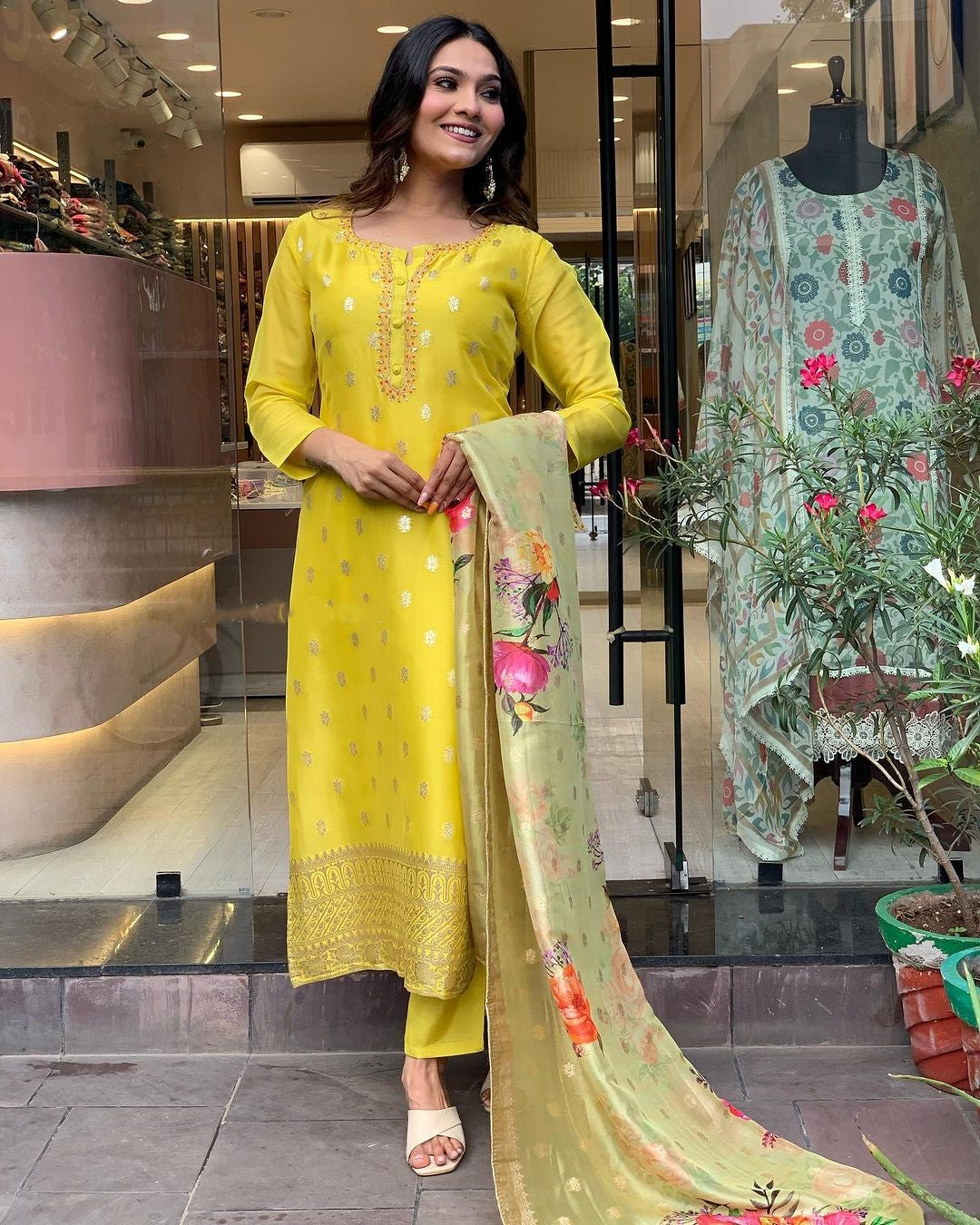 Jecquard yellow traditional outfit with floral dupatta jecqurad