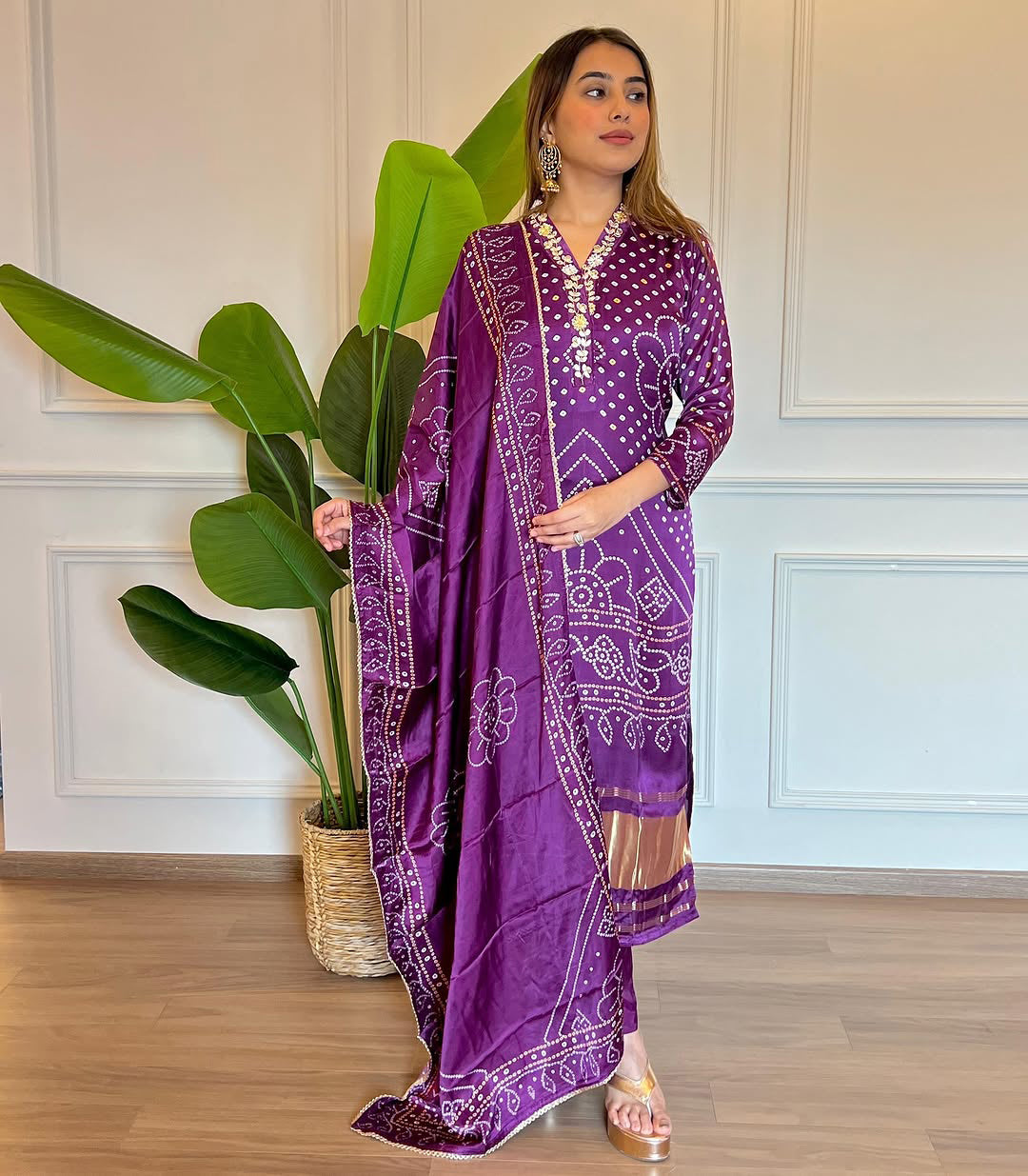  wearing a purple traditional outfit 