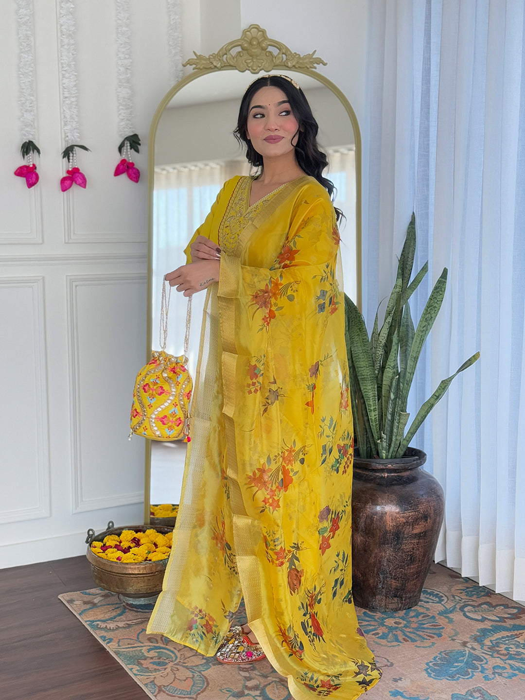 Embrace timeless elegance with this stunning yellow traditional outfit