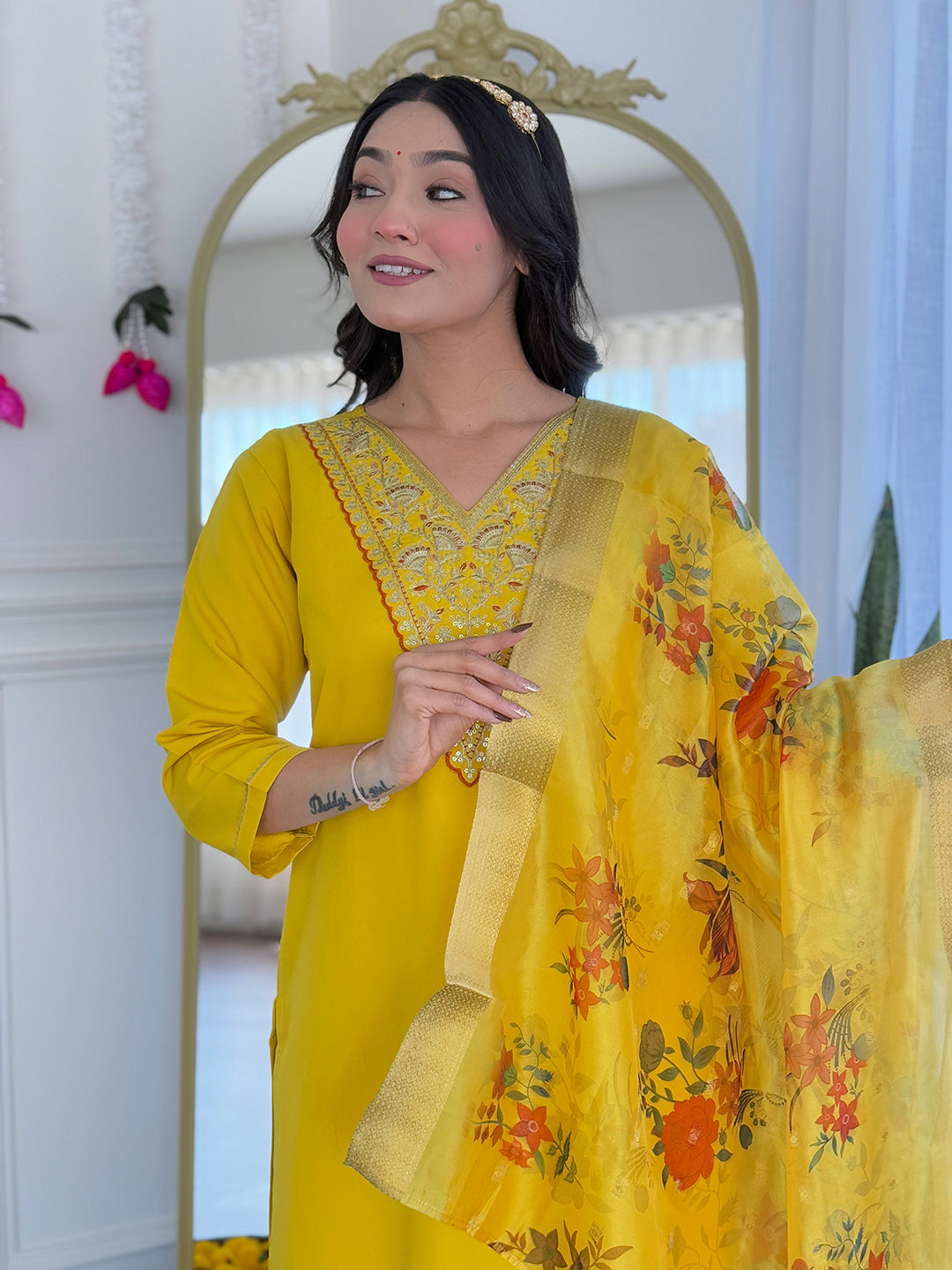 Embrace timeless elegance with this stunning yellow traditional outfit