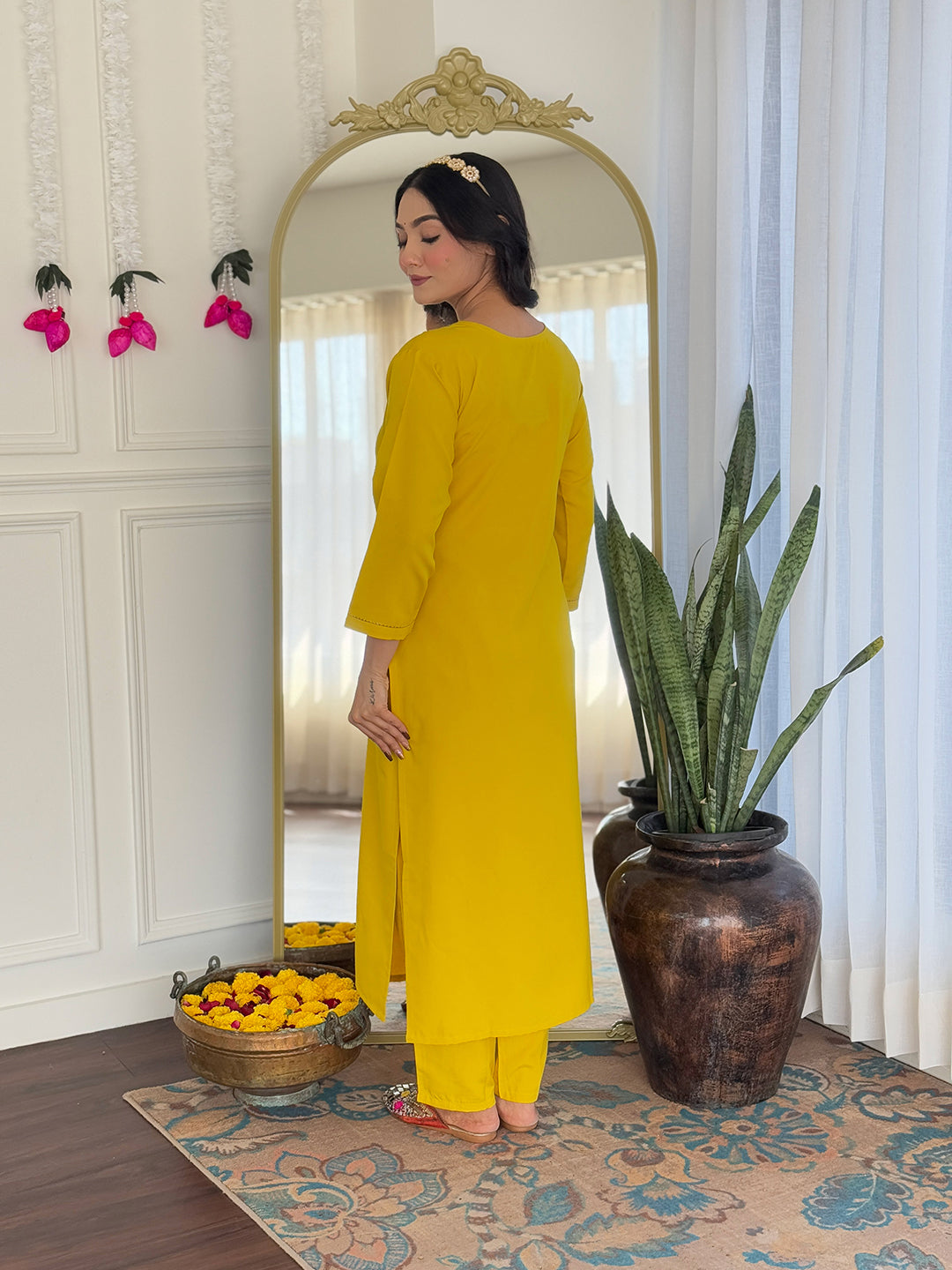Embrace timeless elegance with this stunning yellow traditional outfit
