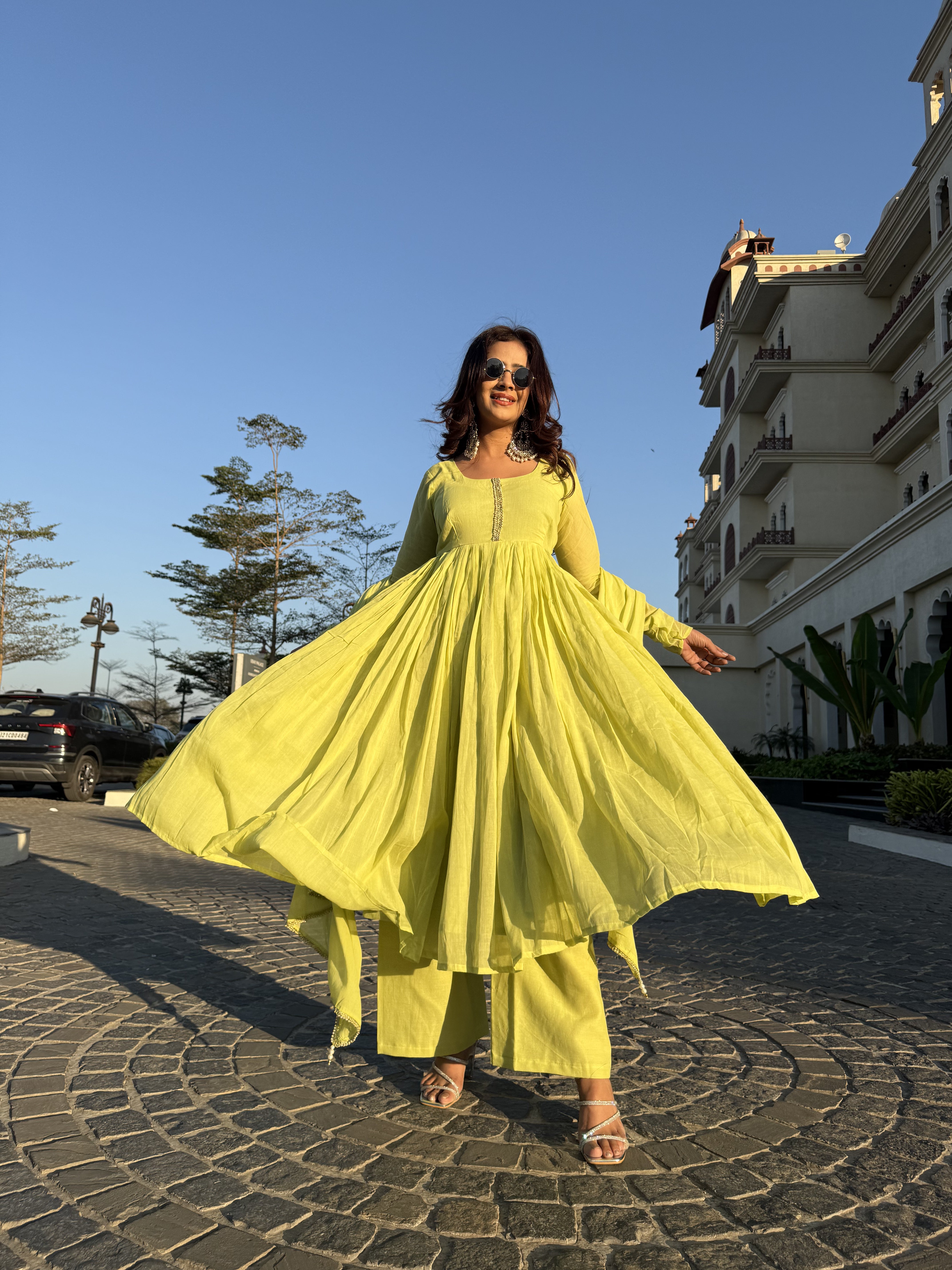 Brighten your wardrobe with this vibrant yellow round outfi