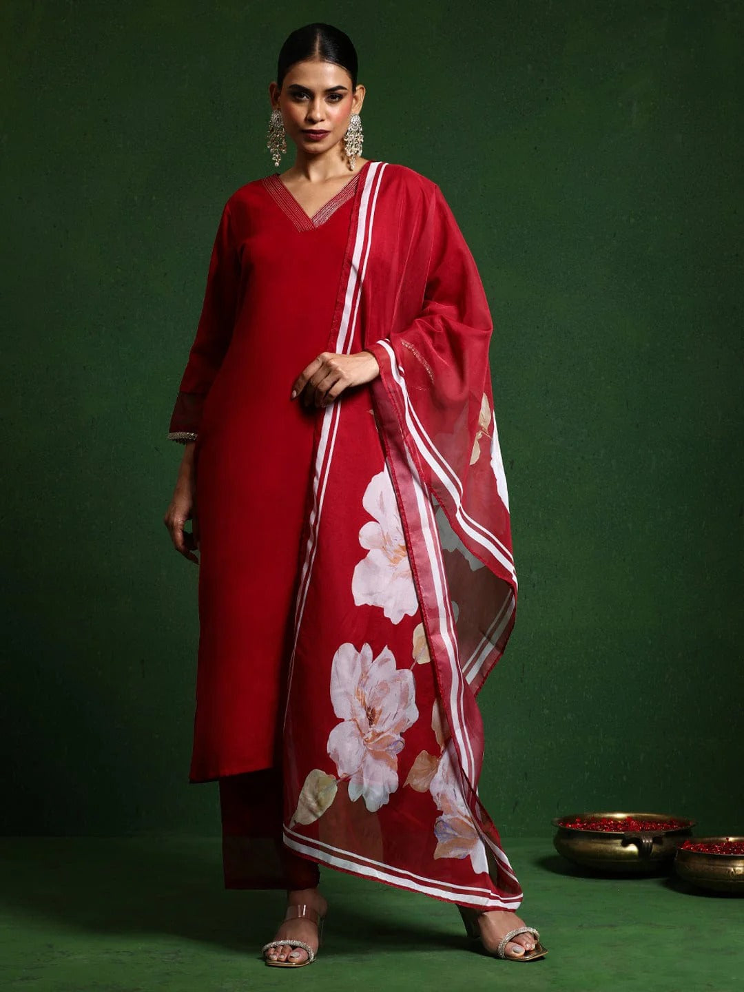  red saree with floral patterns