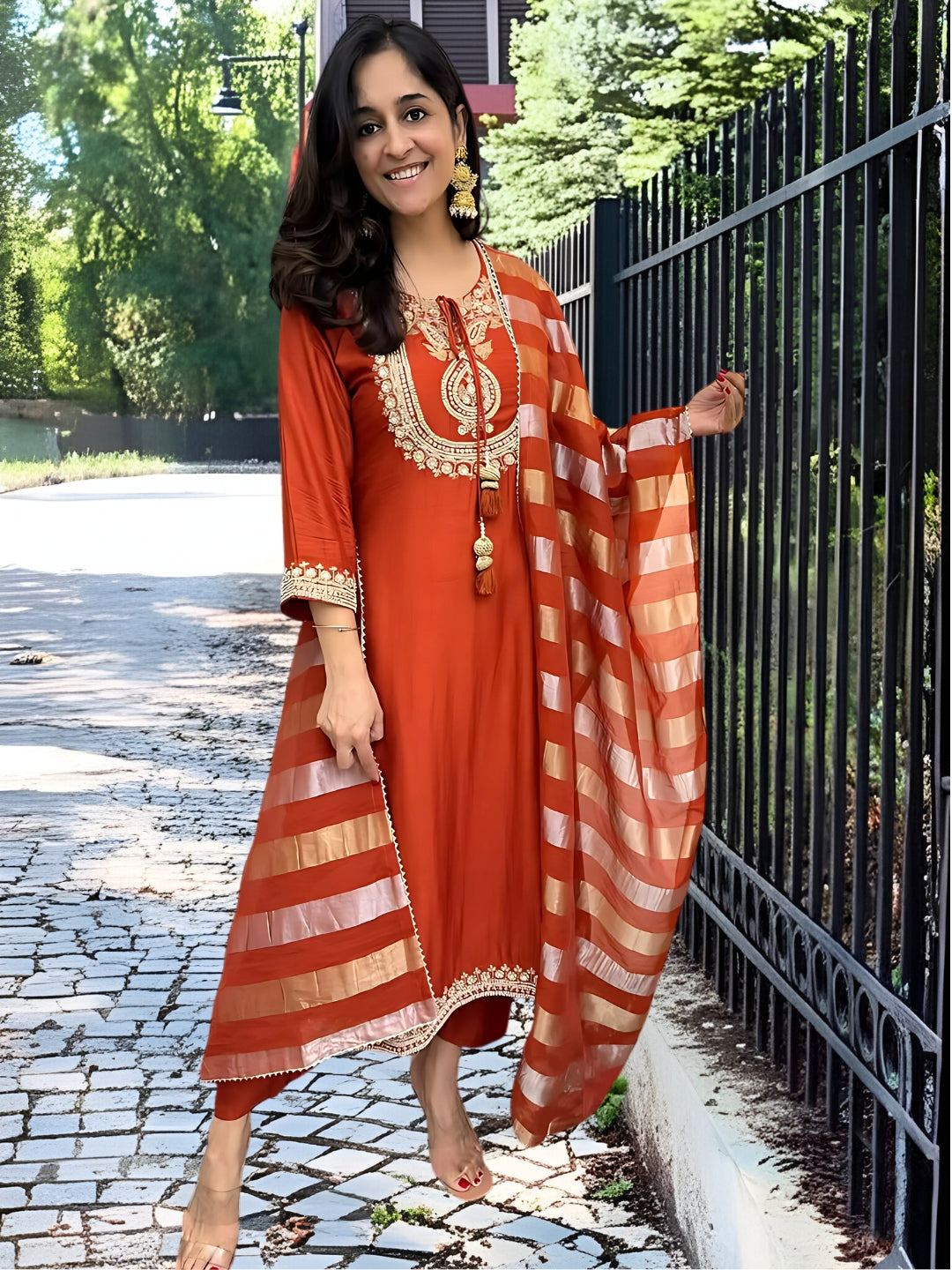  orange traditional outfit with gold embroidery