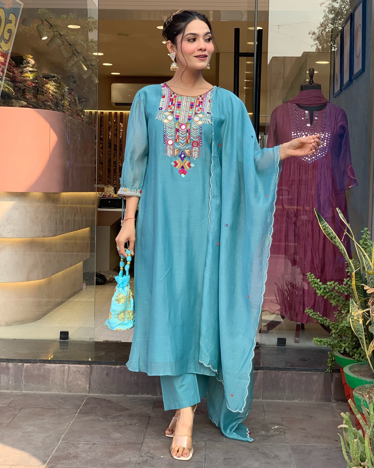 Woman in a blue traditional outfit 
