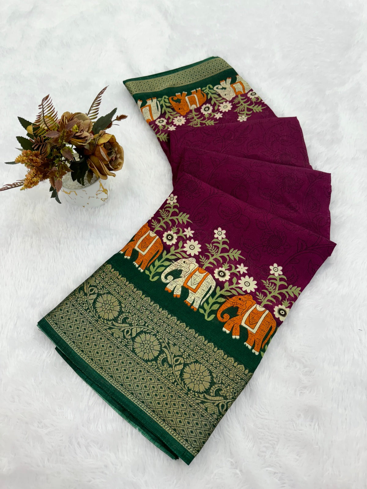 ethnic wardrobe with this exquisite pair of traditional patterned sarees