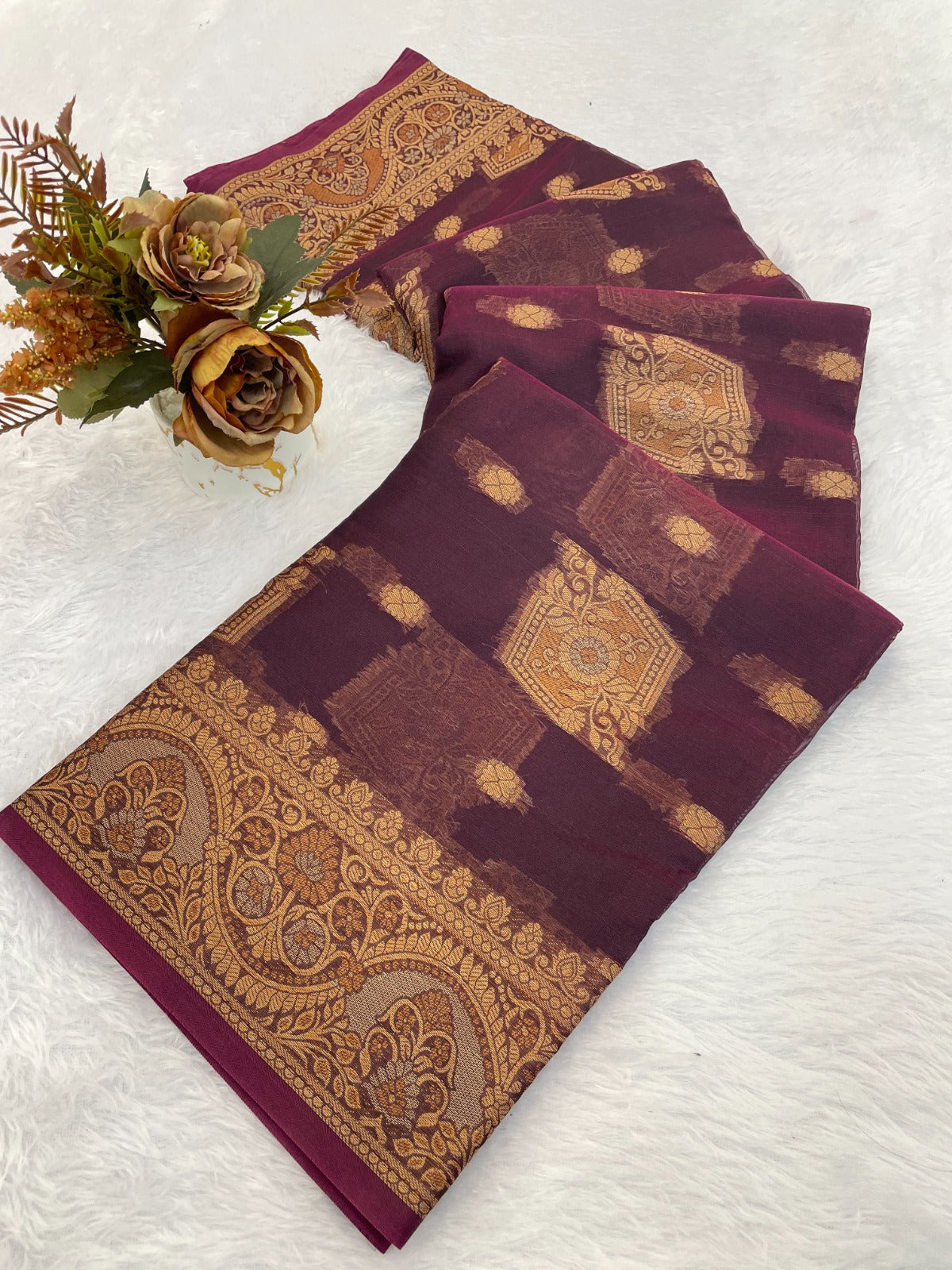 Elevate your ethnic wardrobe with this stunning organza saree