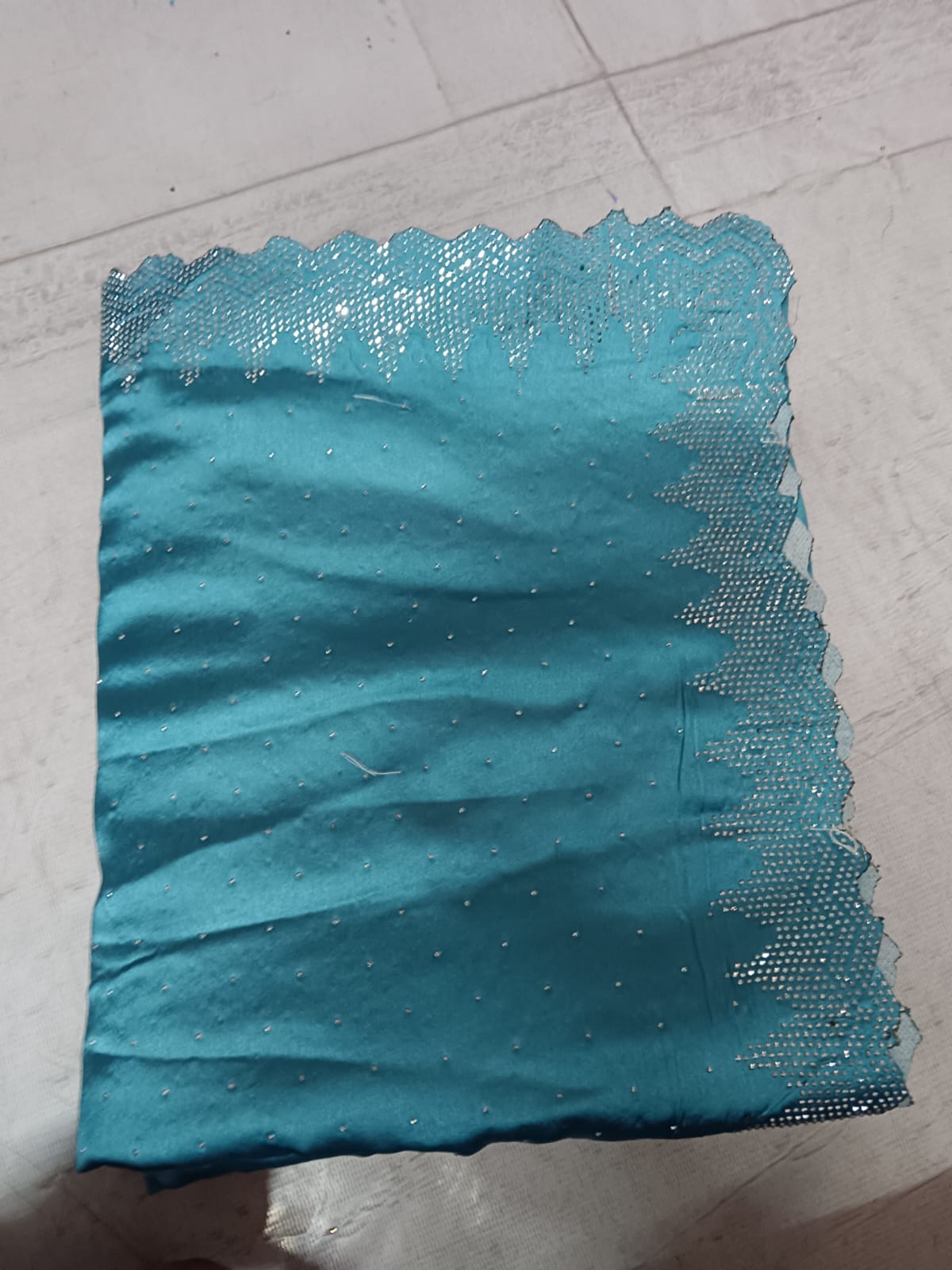 Premium Deep Teal Silk Saree with Intricate Gold Zari Embroidery and Heavy Zarkan Diamond Work.