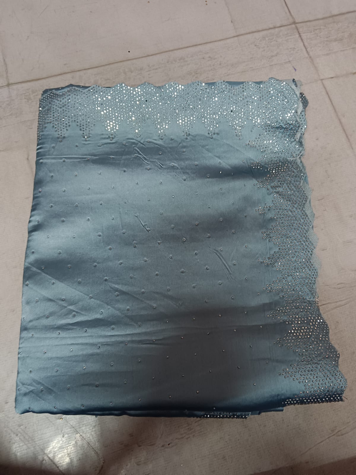 Premium Deep Teal Silk Saree with Intricate Gold Zari Embroidery and Heavy Zarkan Diamond Work.