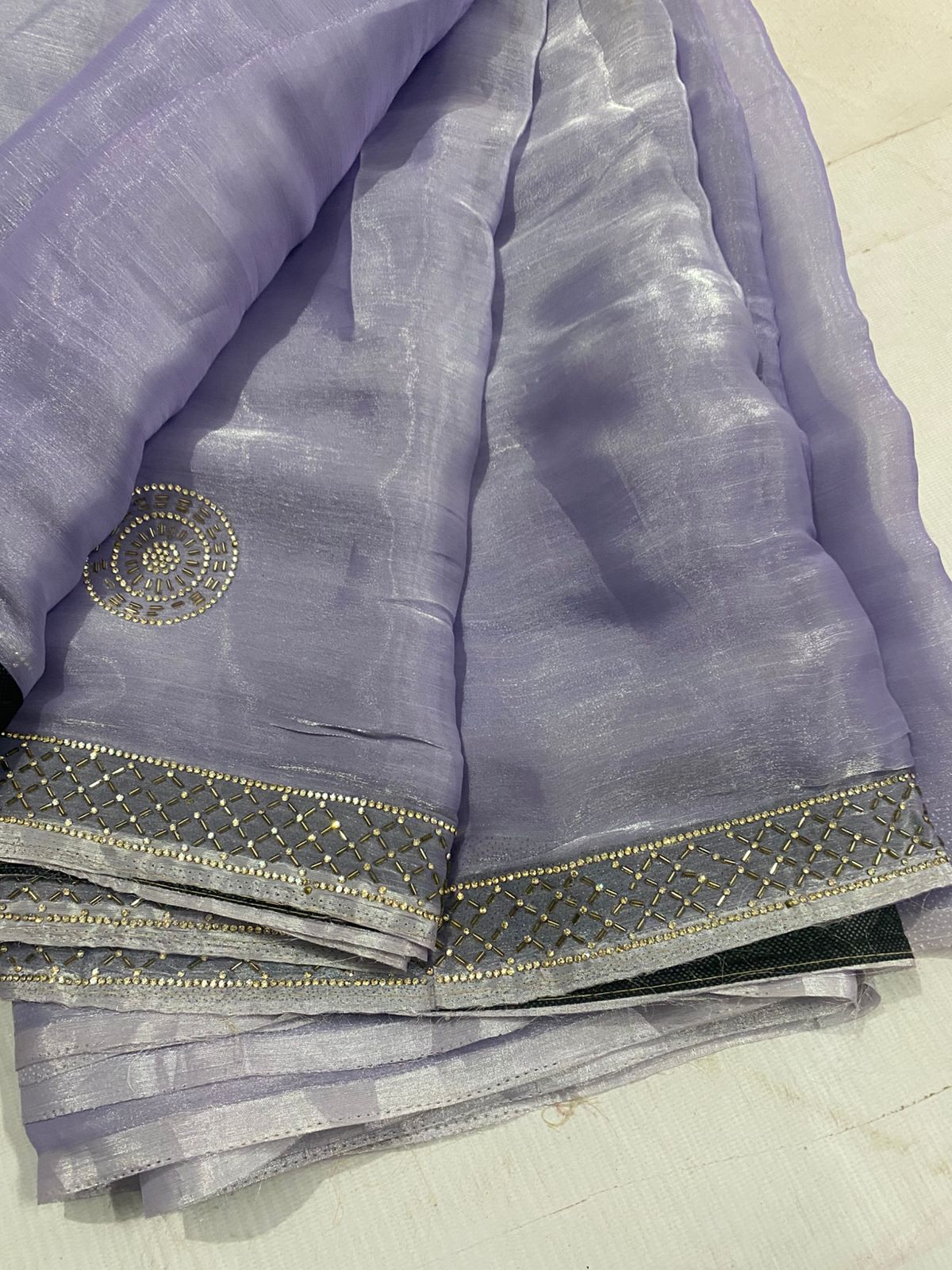 Light purple saree with decorative border