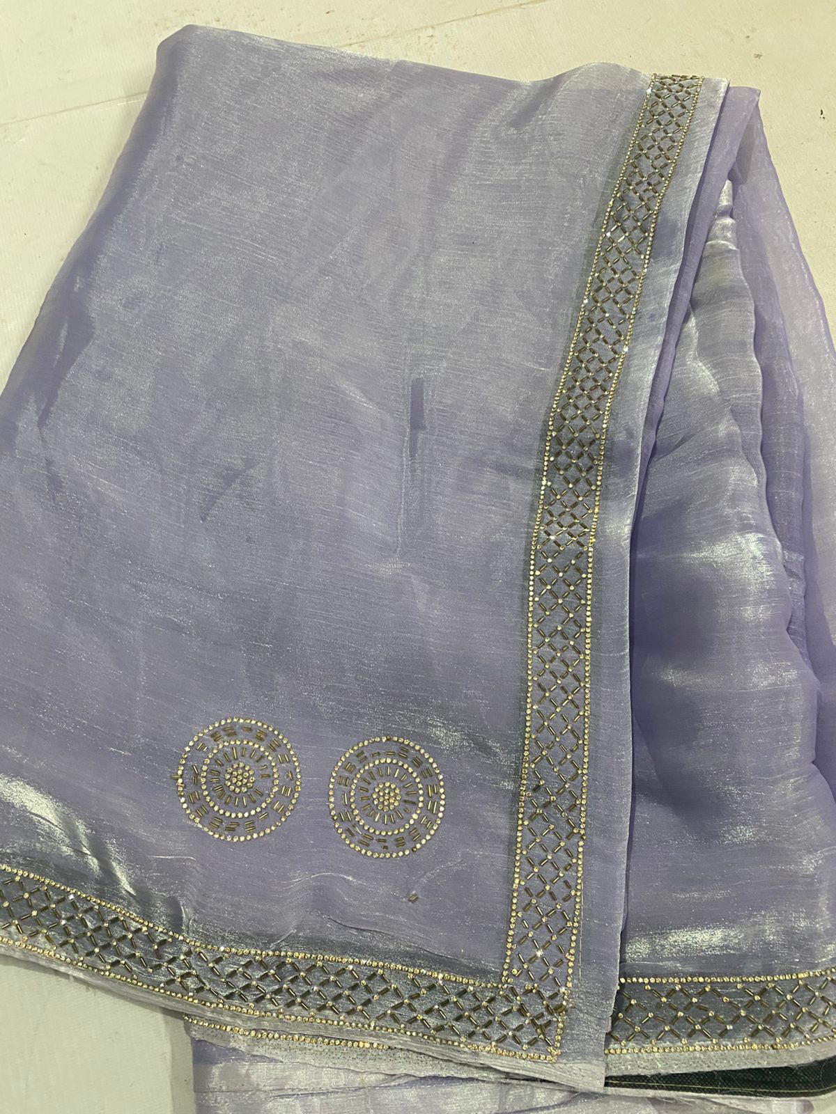 Light purple saree with decorative border
