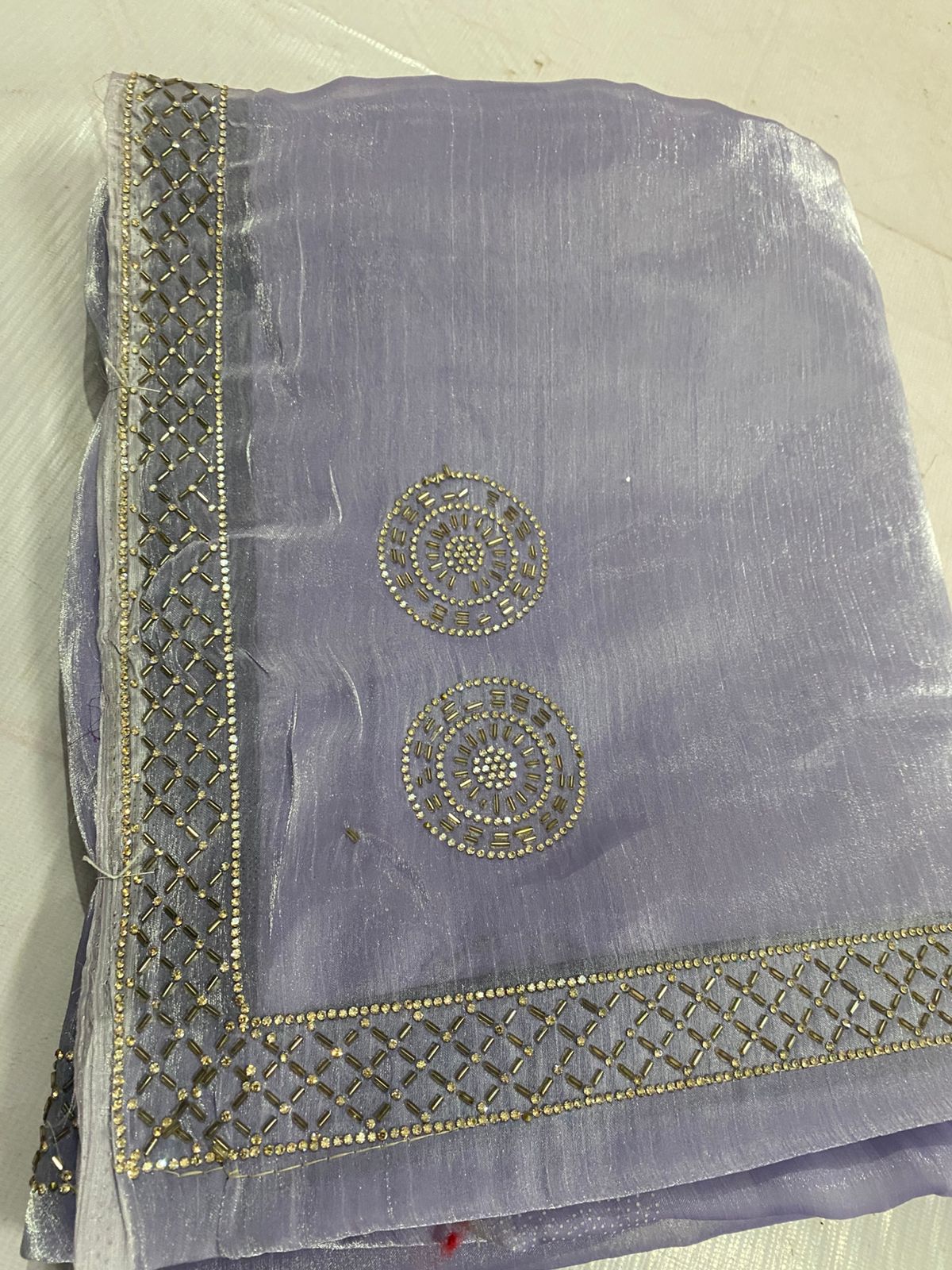 Light purple saree with decorative border