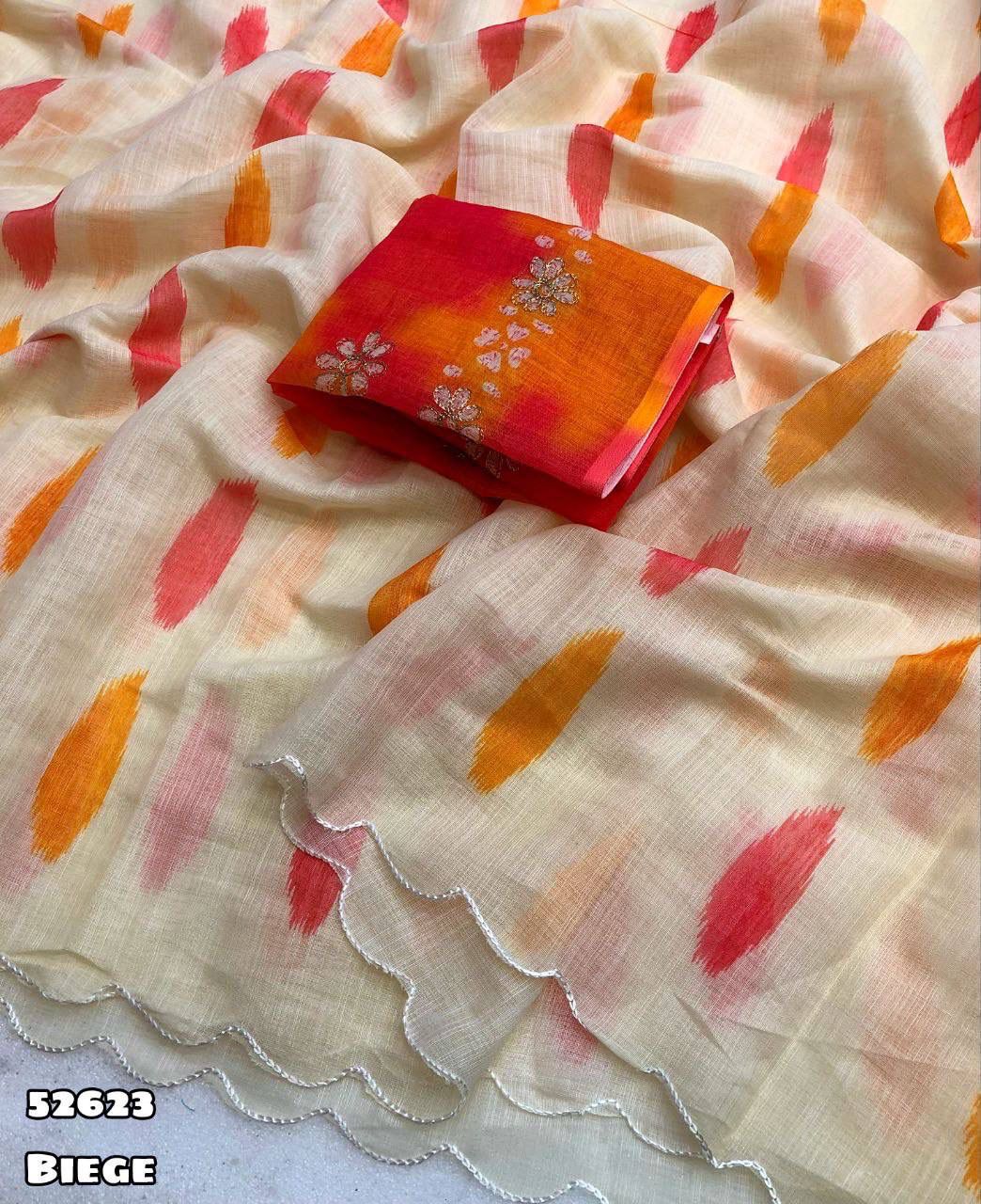 Beige linen fabric with red and orange saree
