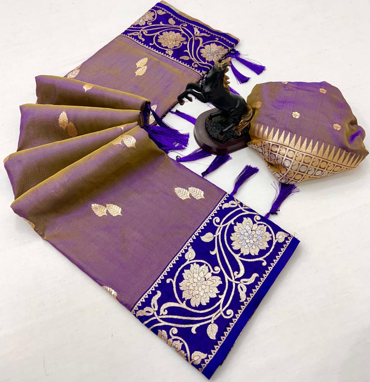 luxury and tradition Crafted pure soft silk, this saree radiates regal charm with its rich zari weaving
