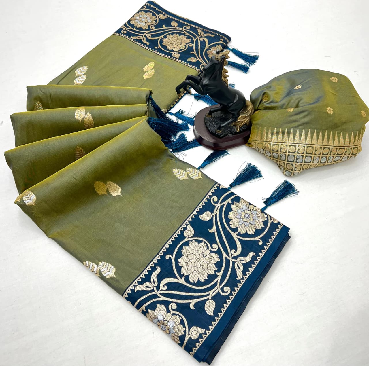 luxury and tradition Crafted pure soft silk, this saree radiates regal charm with its rich zari weaving