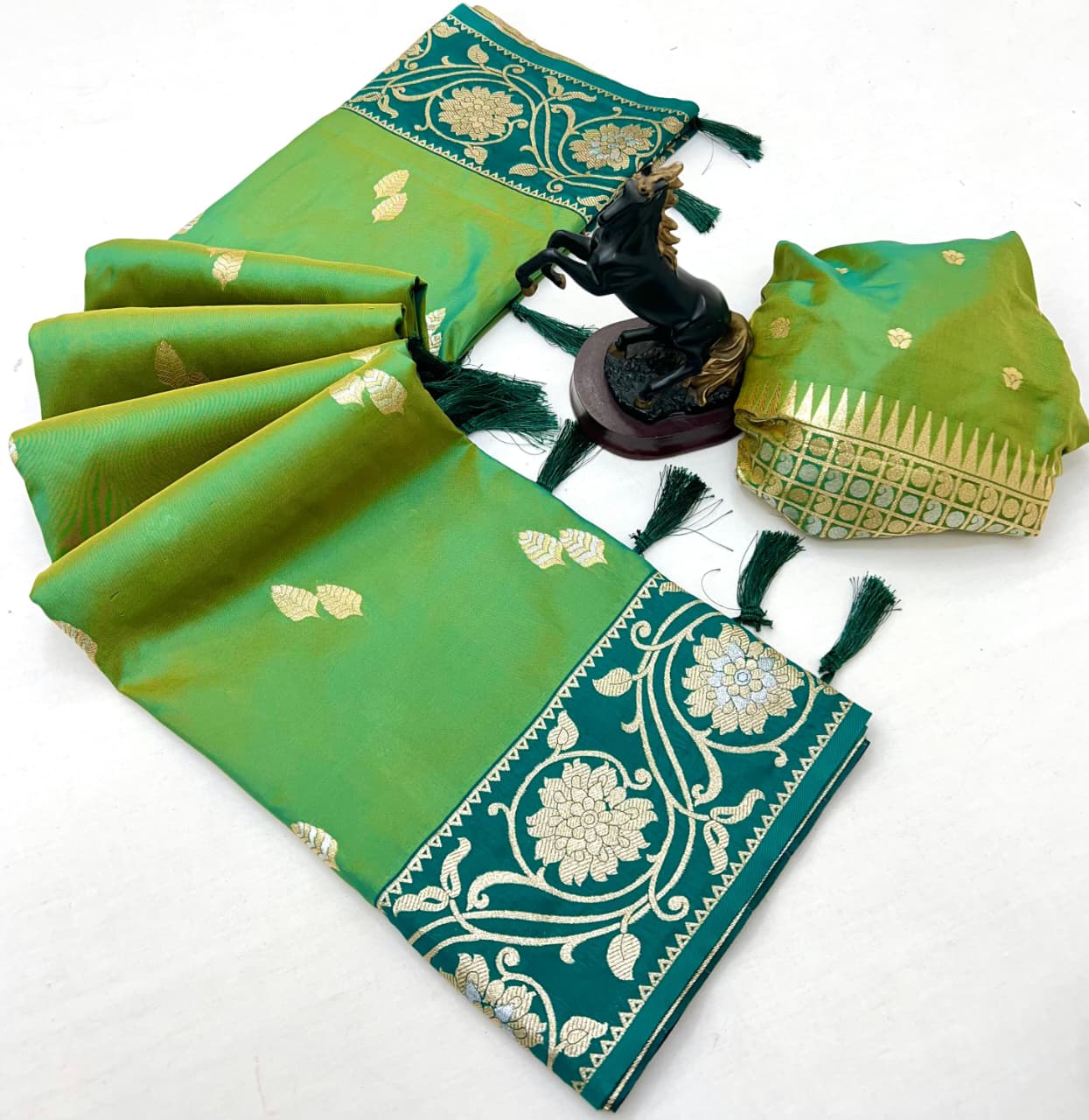 luxury and tradition Crafted pure soft silk, this saree radiates regal charm with its rich zari weaving