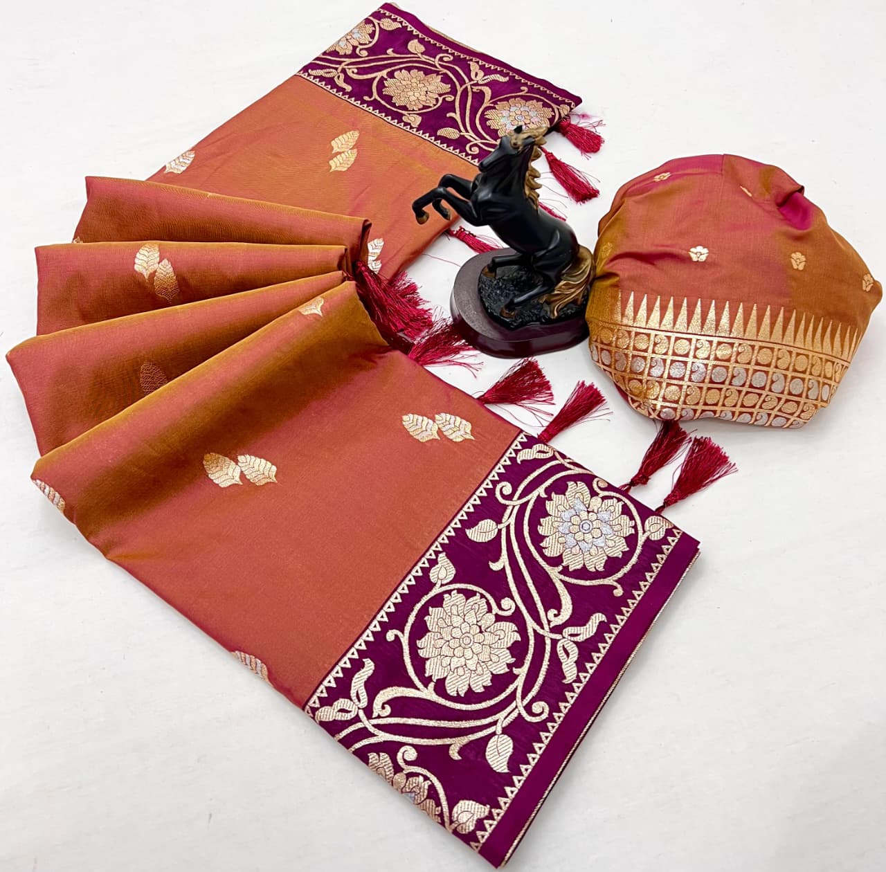 luxury and tradition Crafted pure soft silk, this saree radiates regal charm with its rich zari weaving