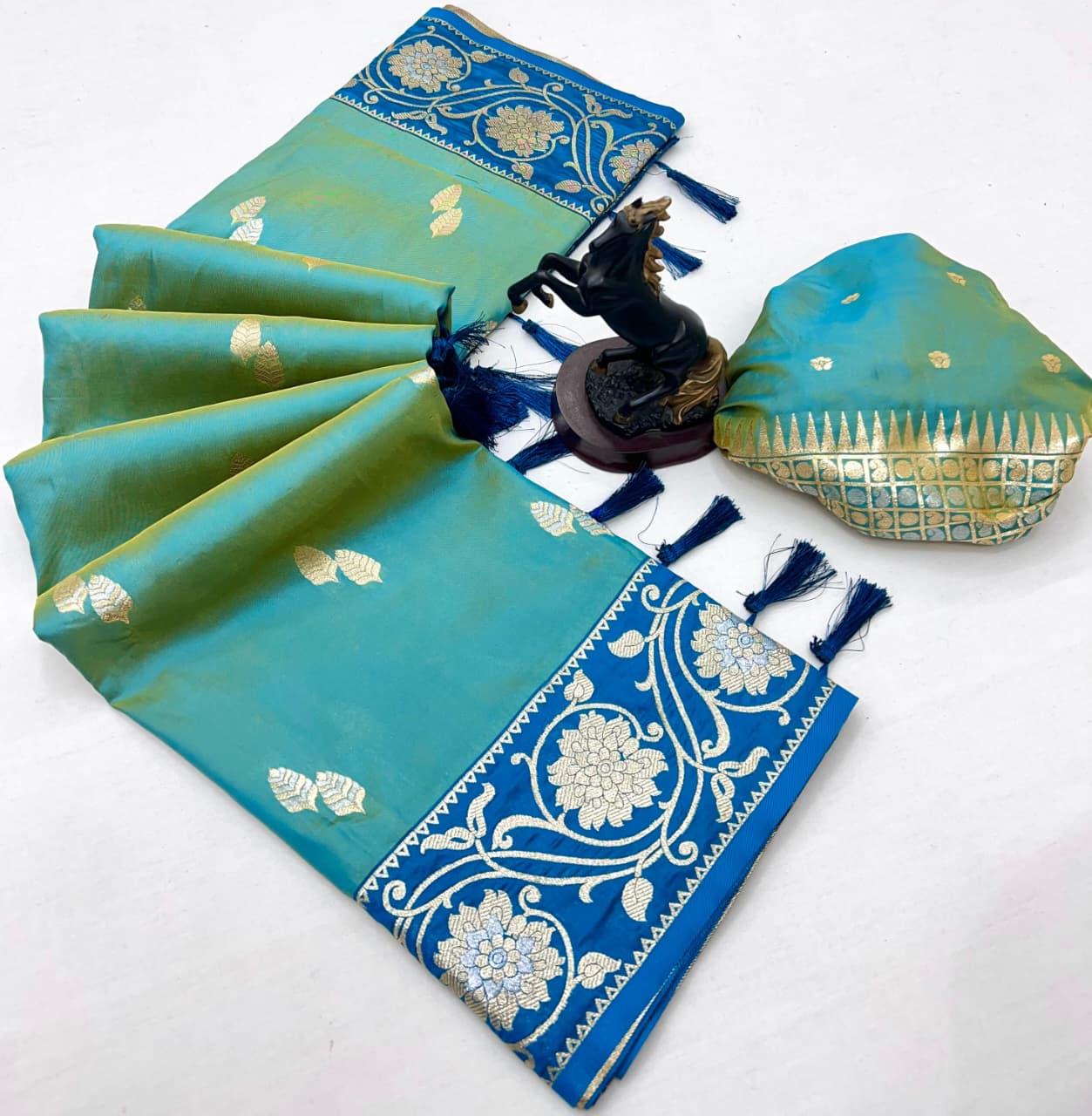 luxury and tradition Crafted pure soft silk, this saree radiates regal charm with its rich zari weaving