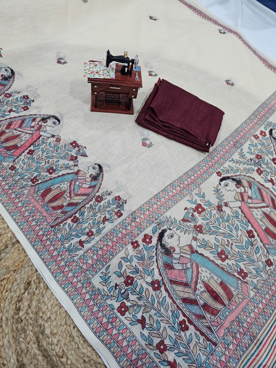 off white linen  saree with flower and traditional motif