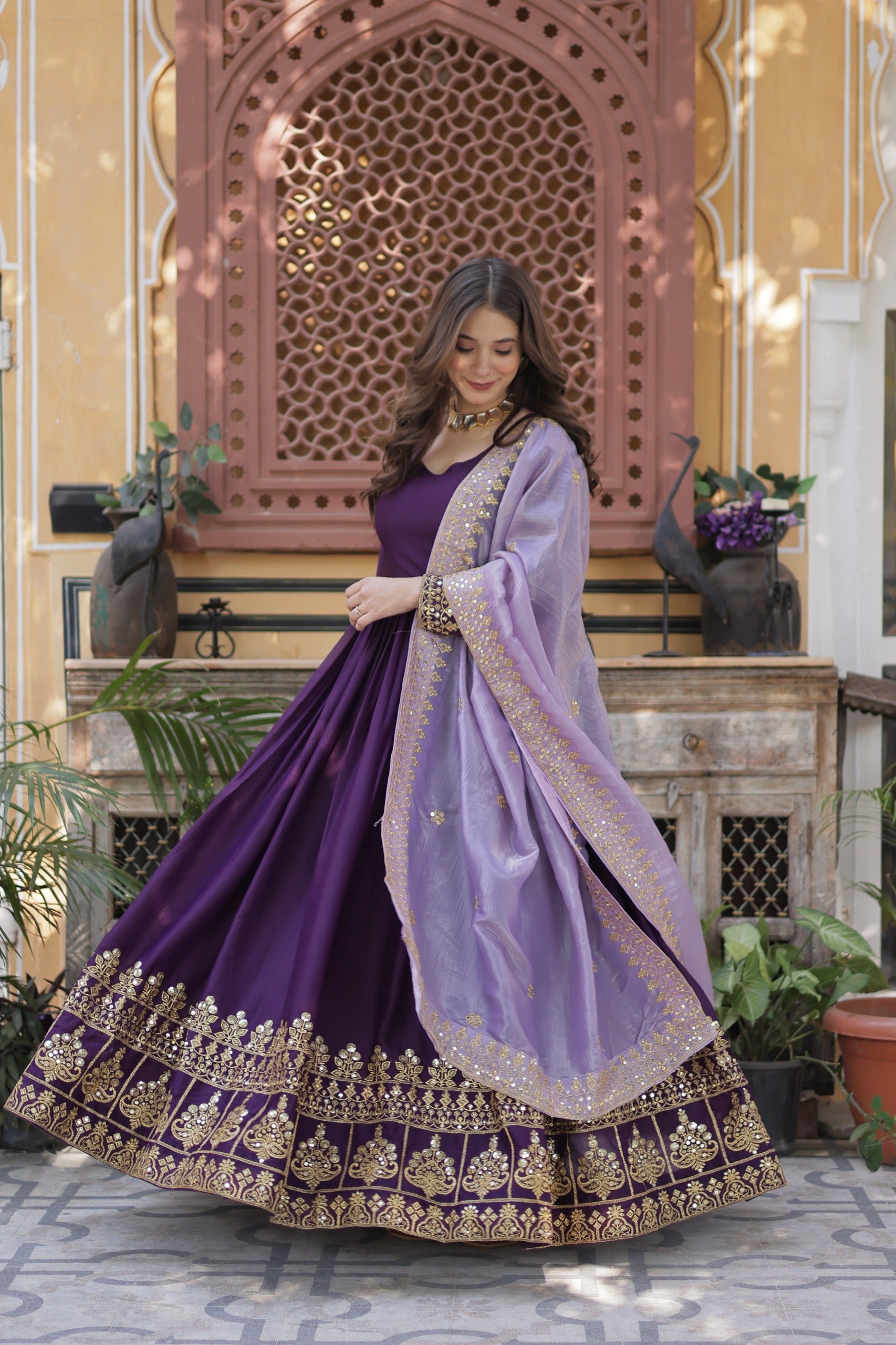 purple  gown with embroidery work